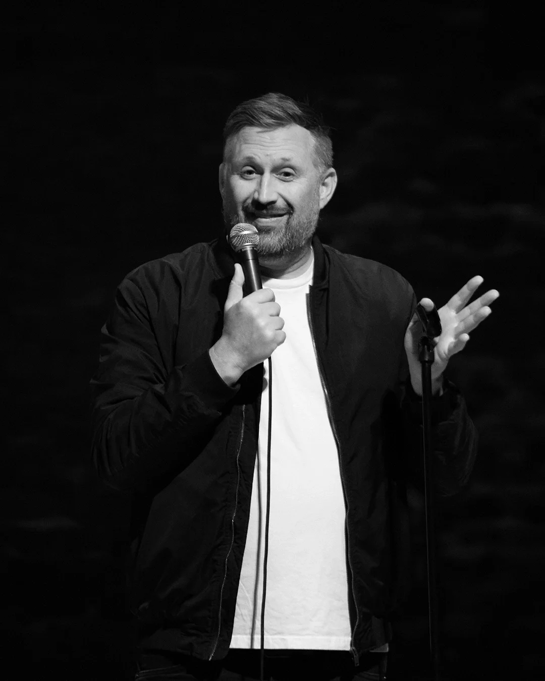 Josh Nelson Explaining- B&W- Final.webp