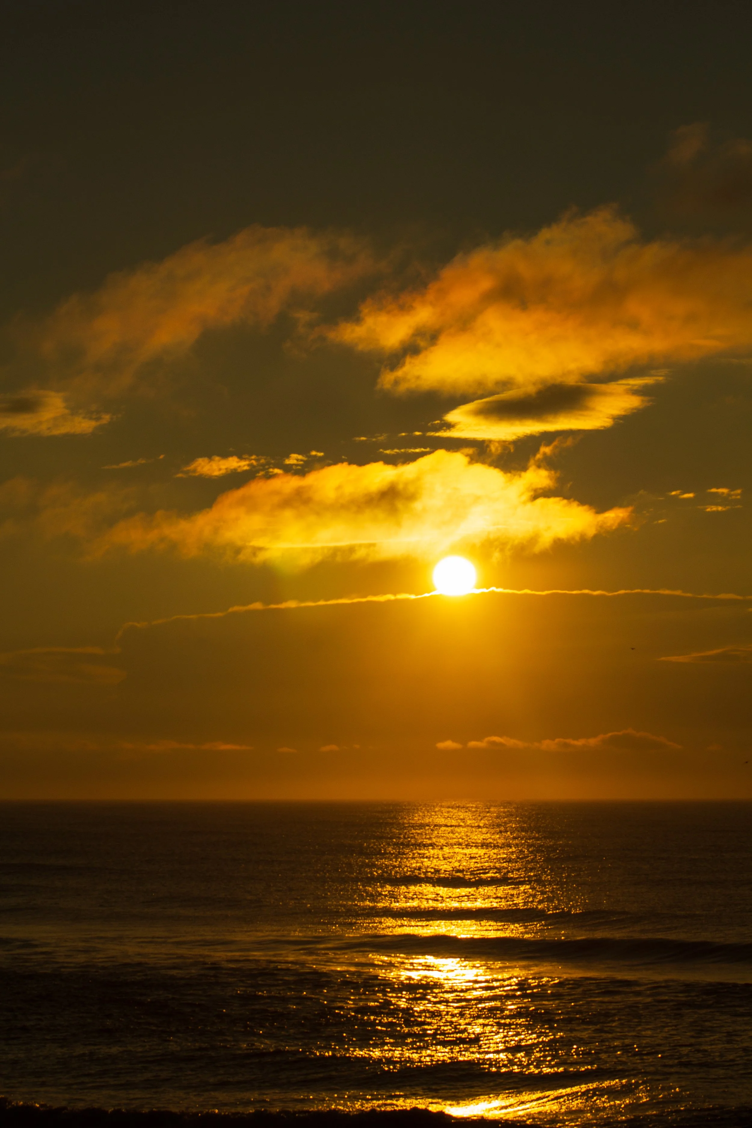 1:1 Sunrising Over Cloudy Horizon (Portrait).jpg