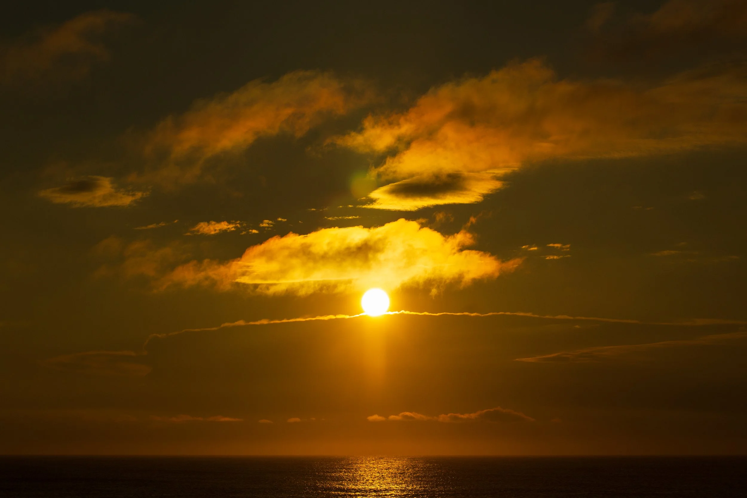1:1 Sunrising Over Cloudy Horizon (Landscape).jpg