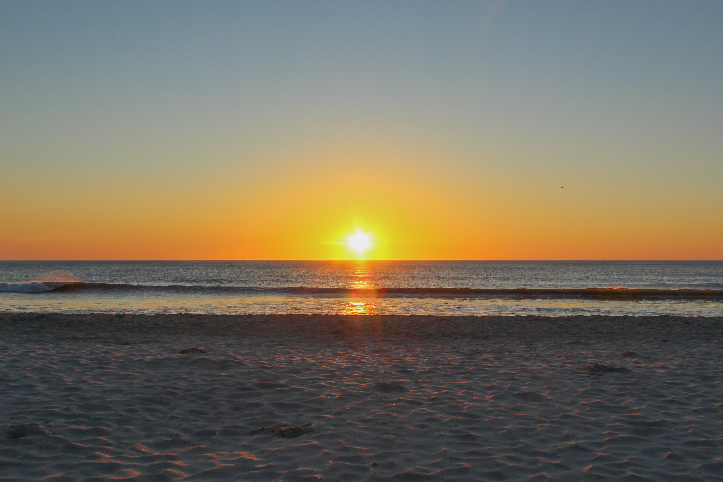 1:10 OBX Beach Sunrise Flare.png