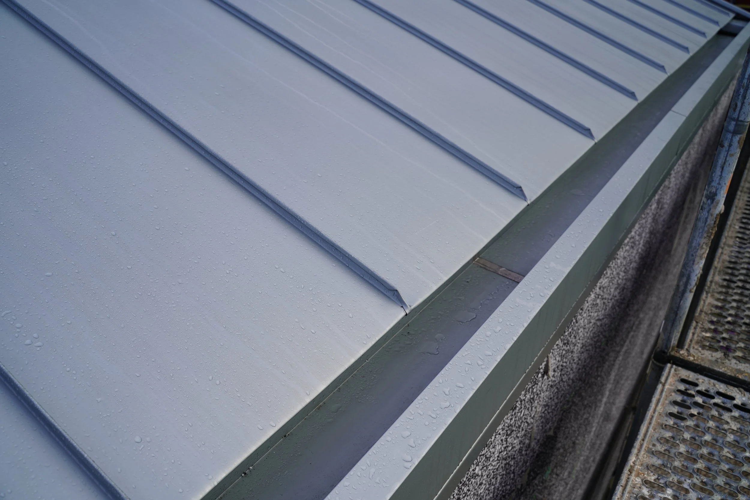 VM Zinc roof installation, new build, high-end, architectural custom build, standing seam roof plumber.