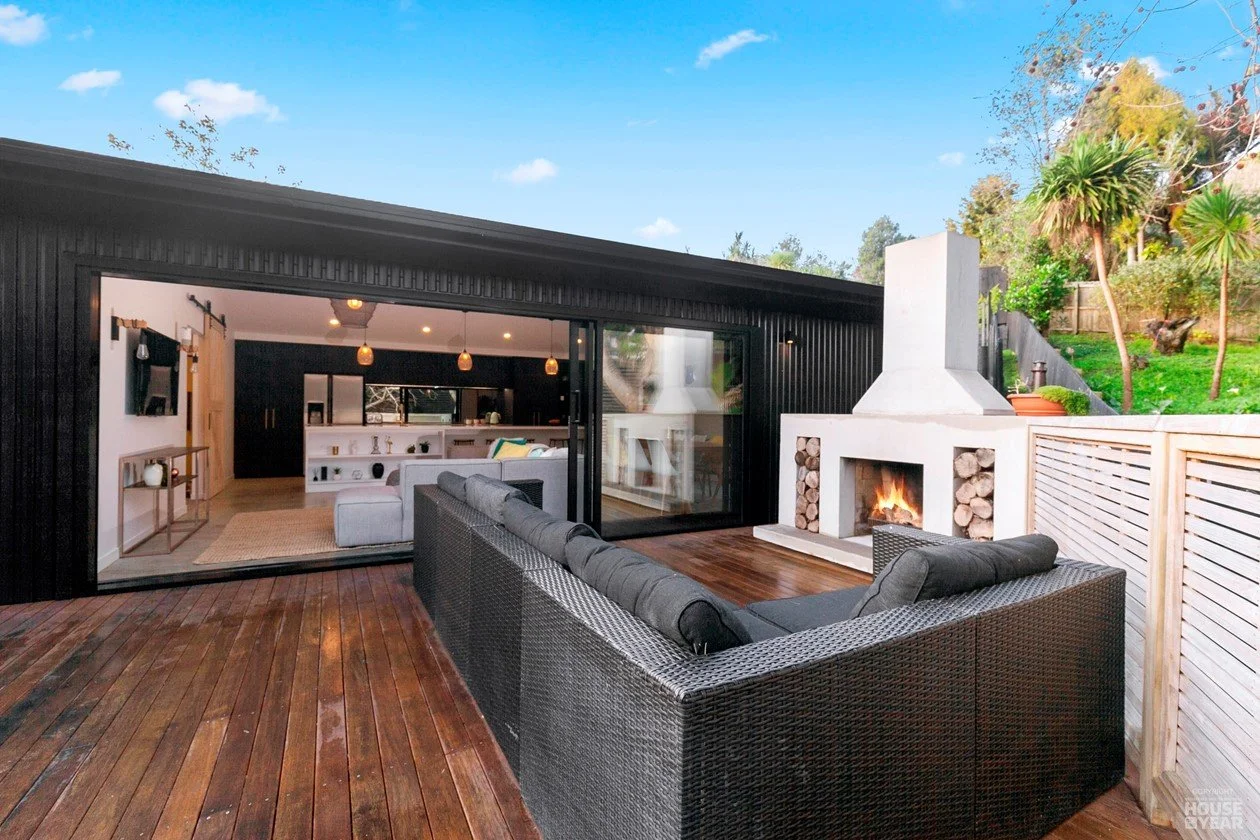View of back deck into living area on House of the Year Builders Own Home entry in Rothesay Bay where Swift Roofing installed Trimrib Profile Roof & Dimondclad Rib50 Wall Cladding - Image c/o House of the Year