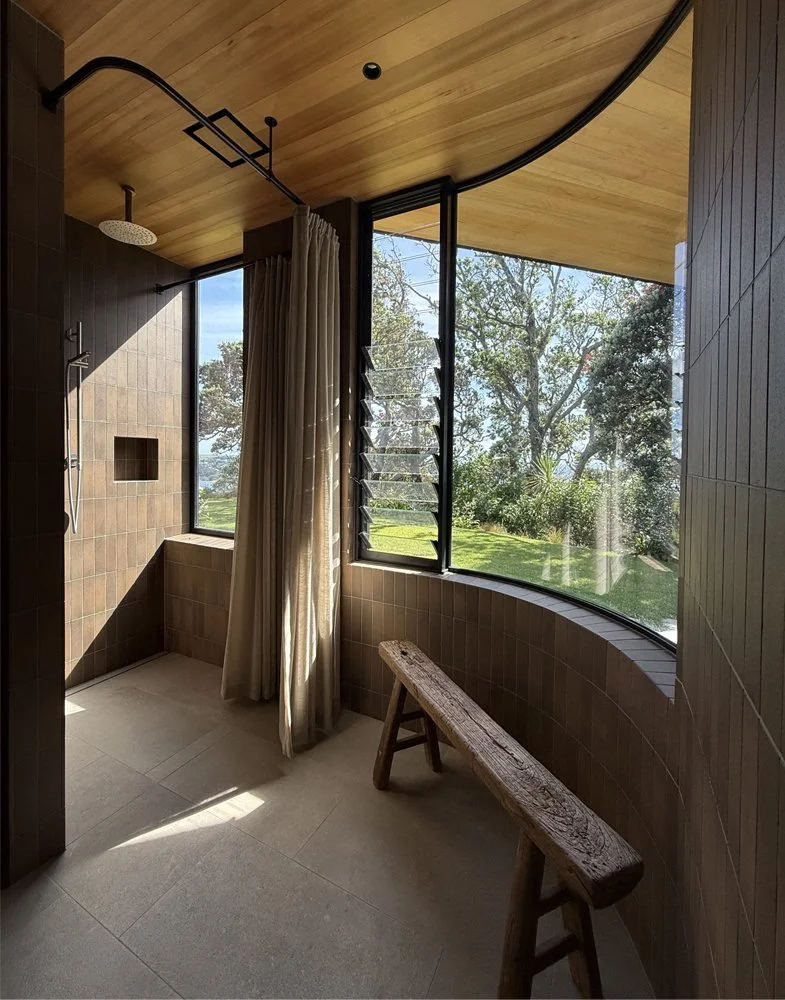 Inside view out of Ti Point House, a Lindesay / Construction Crosson Architects / Rochford Landscapes project where Swift Roofing installed RT7 Roof in ColorCote Horoeka coloured MagnaFlow from Roofing Industries. Photo Crosson Architects
