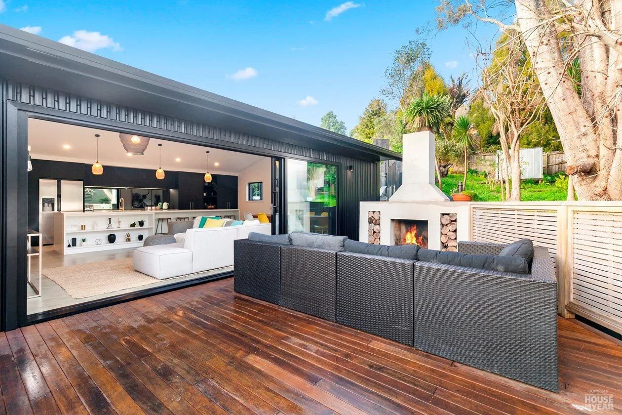 View of back deck into living area on House of the Year Builders Own Home entry in Rothesay Bay where Swift Roofing installed Trimrib Profile Roof & Dimondclad Rib50 Wall Cladding - Image c/o House of the Year