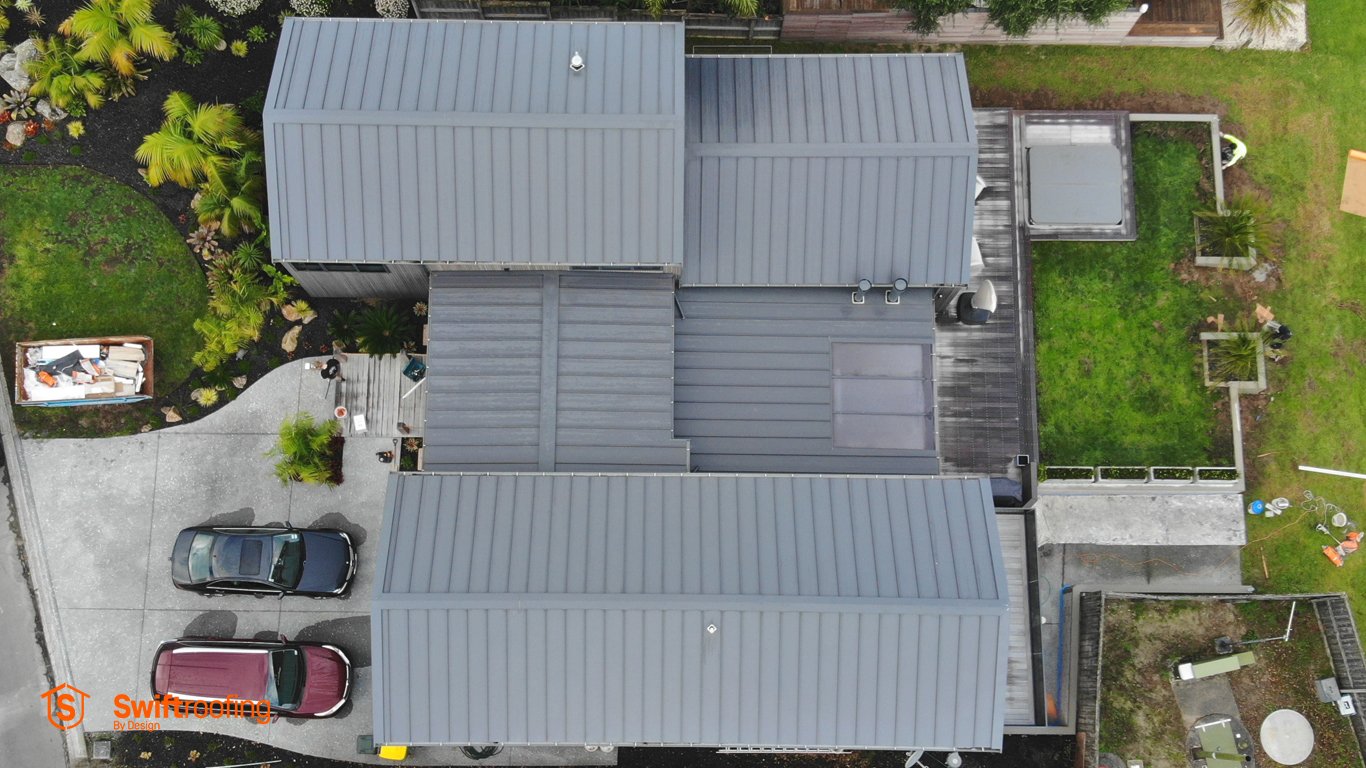 Direct down drone view onto roof of Best Nest Building Co New Build in progress in Omaha where Swift Roofing installed Eurostyle Spanlok 450 Roof - Image c/o Best Nest Building Co