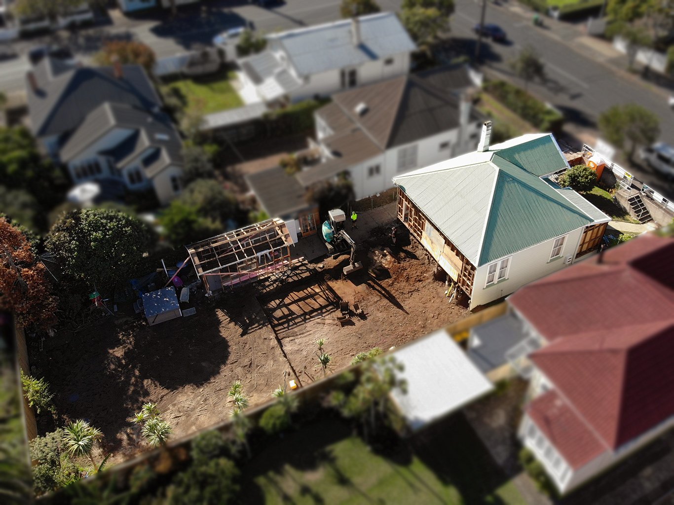 Drone view down onto start of Devonport project where Swift Roofing installed Colorsteel Maxx Grey Friars coloured roofs to the existing house, the new addition and the minor dwelling. Broswick Builders won a National Top 100 Award, was the Regional