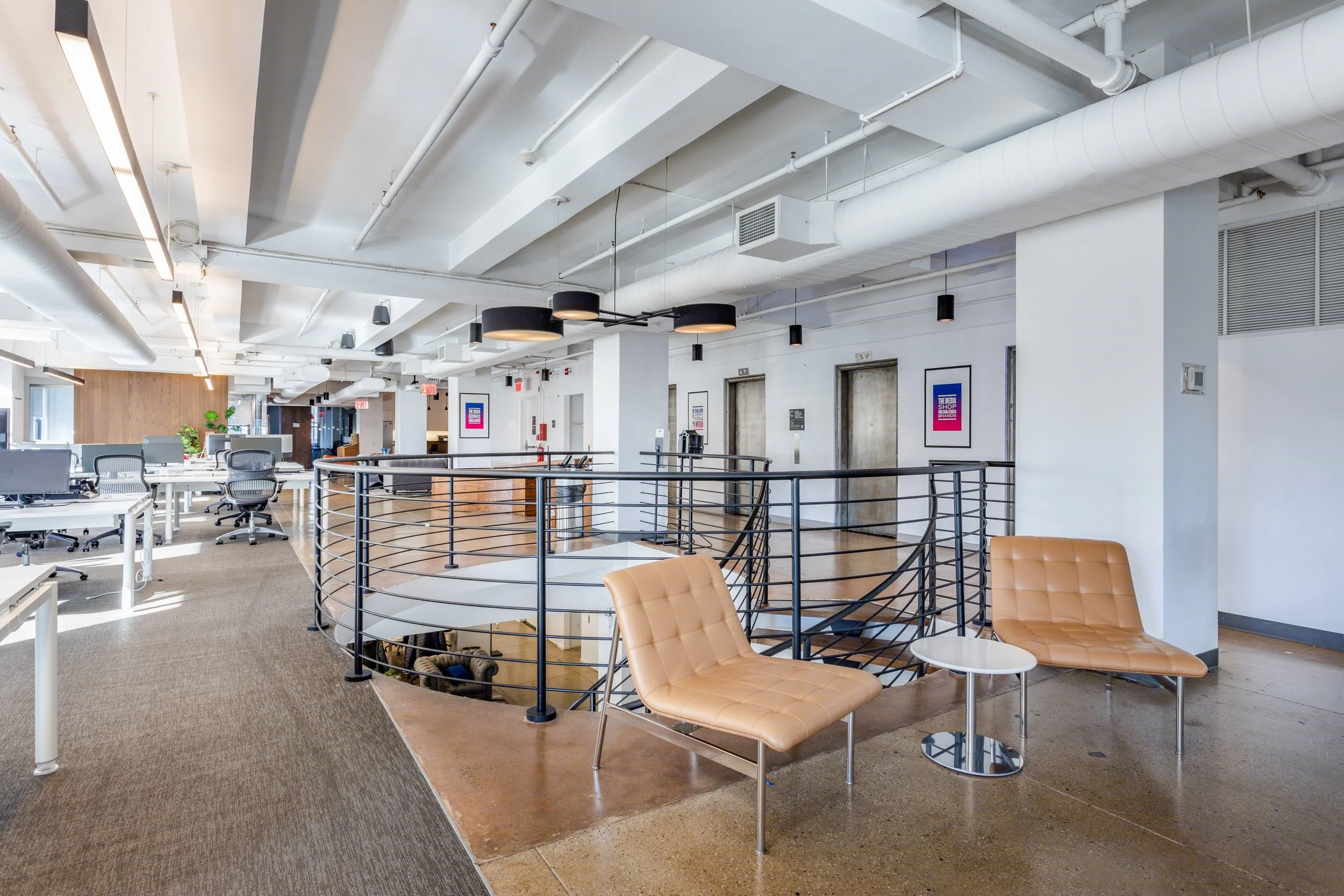 Duplex Office with Through-floor Circular Staircase