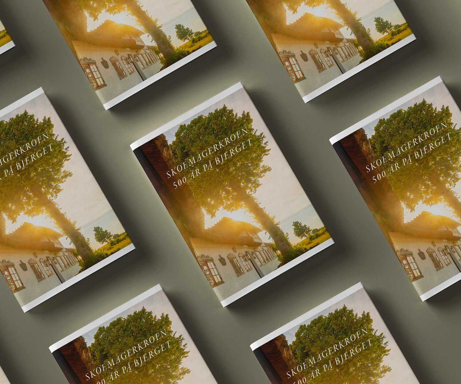 Covers of a book about the restaurant Skoemagerkroen.