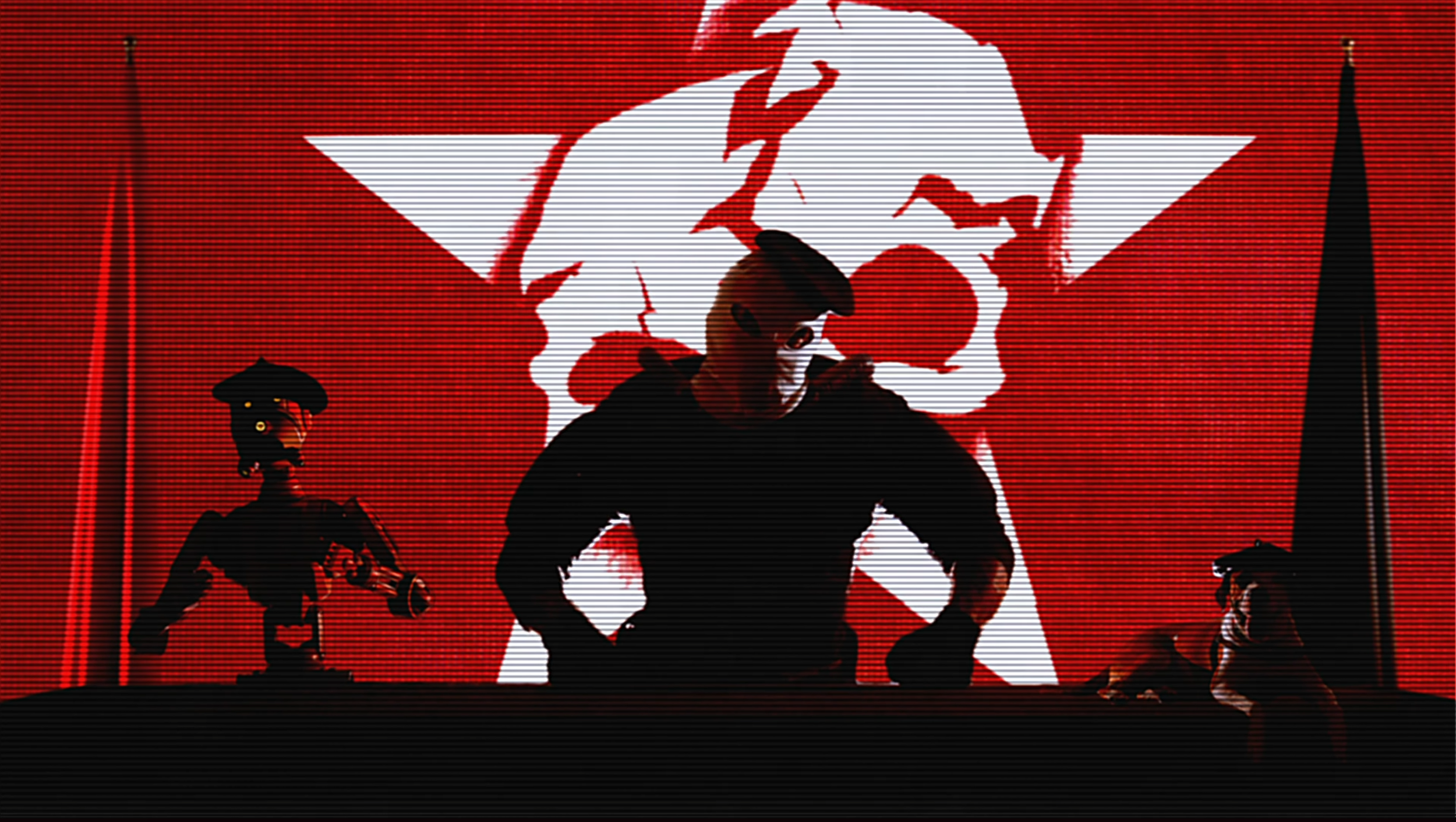Silhouette of a person with a hat and mask standing in front of a red background featuring a large clown face with red nose, with two smaller characters on either side.