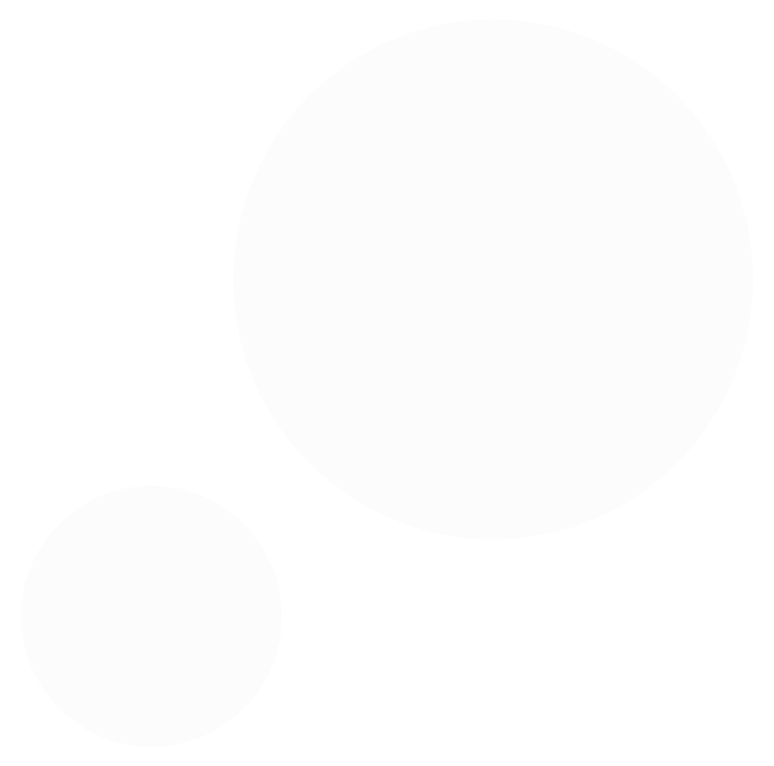Two white circles, one large and one small, on a black background.