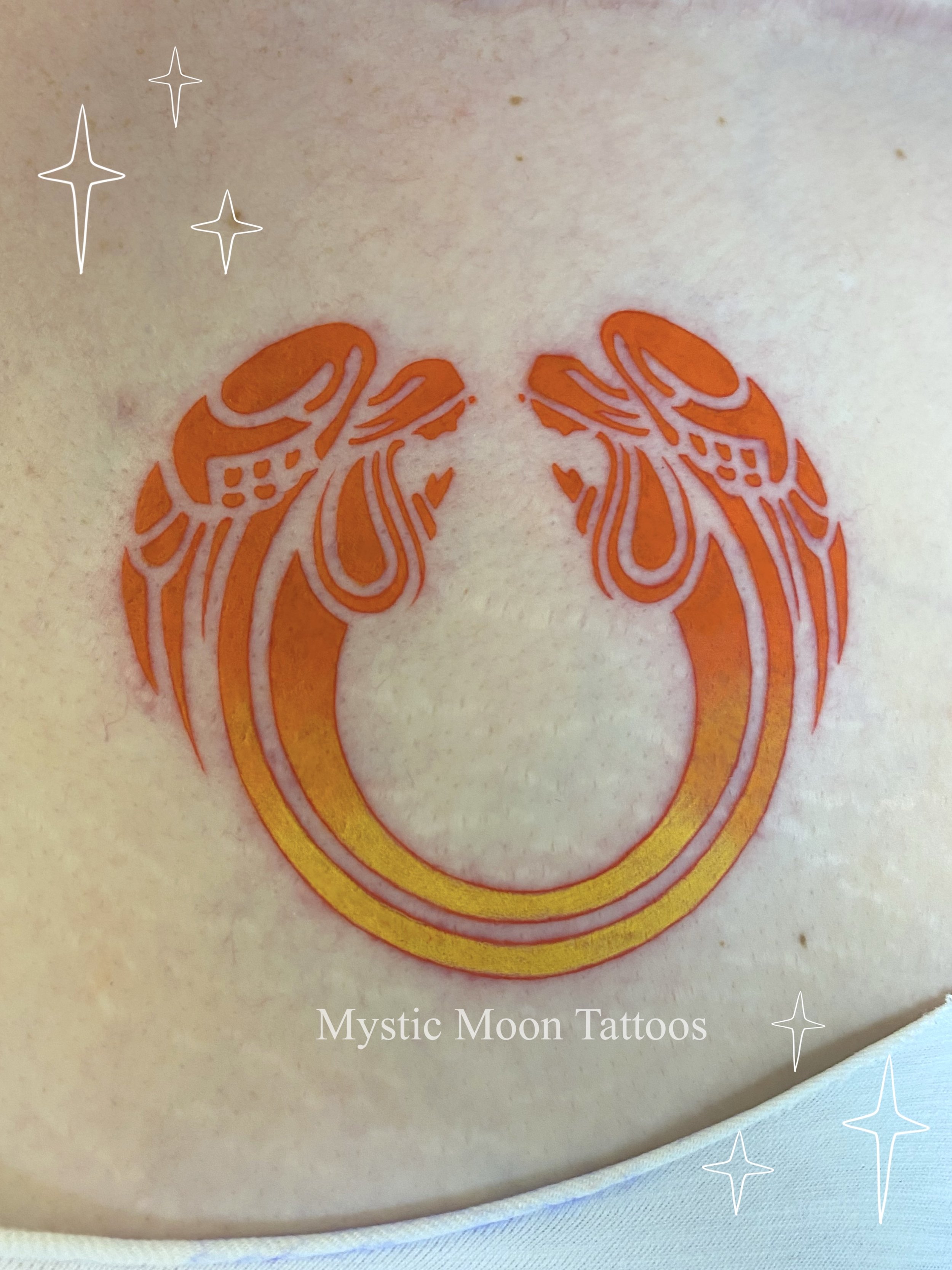 (Part 2)Tattoo from the musical "Jesus Christ Superstar"! We rocked out to the musical soundtrack while our lovely client got matching symbols on both sides of her chest! Matching with part 1.