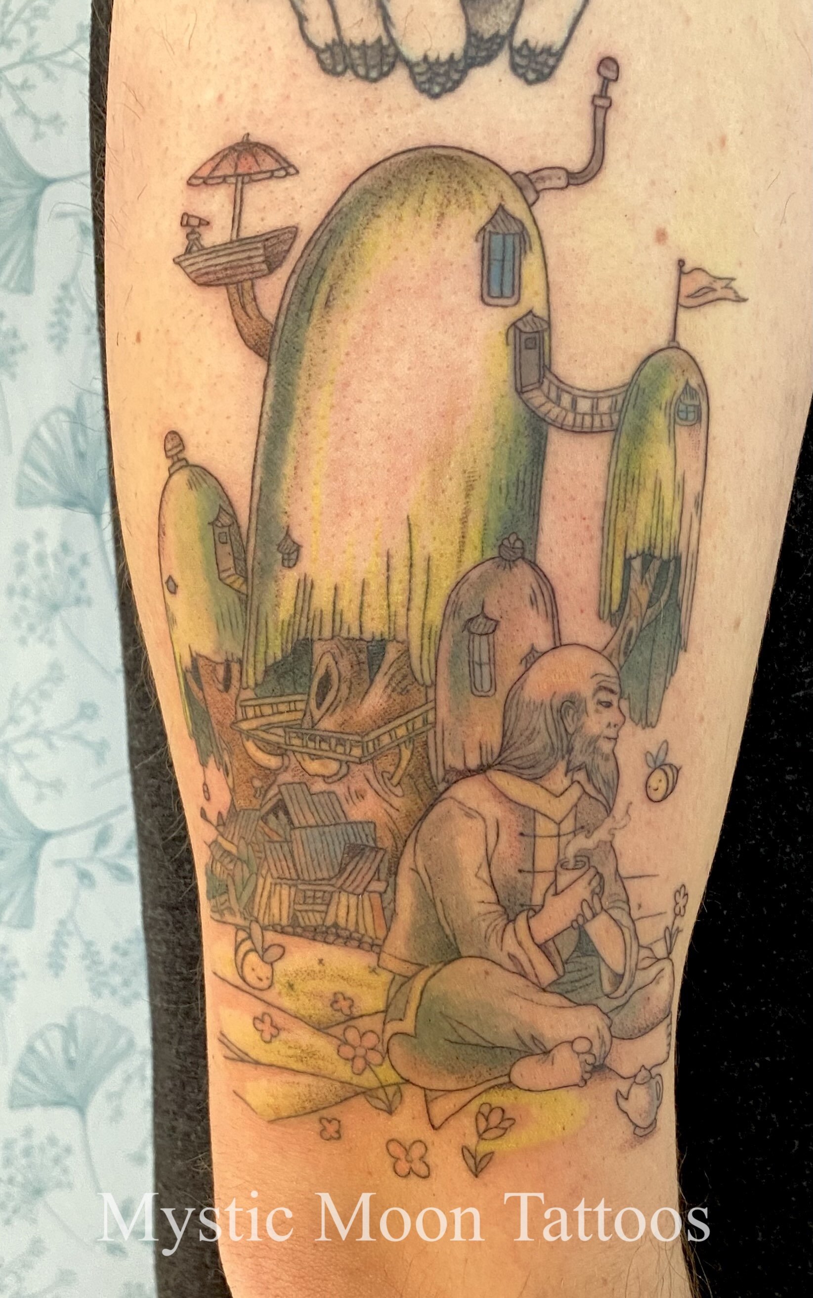 Crossover of the Adventure Time treehouse and scenery and Uncle Iroh from Avatar: The Last Airbender.