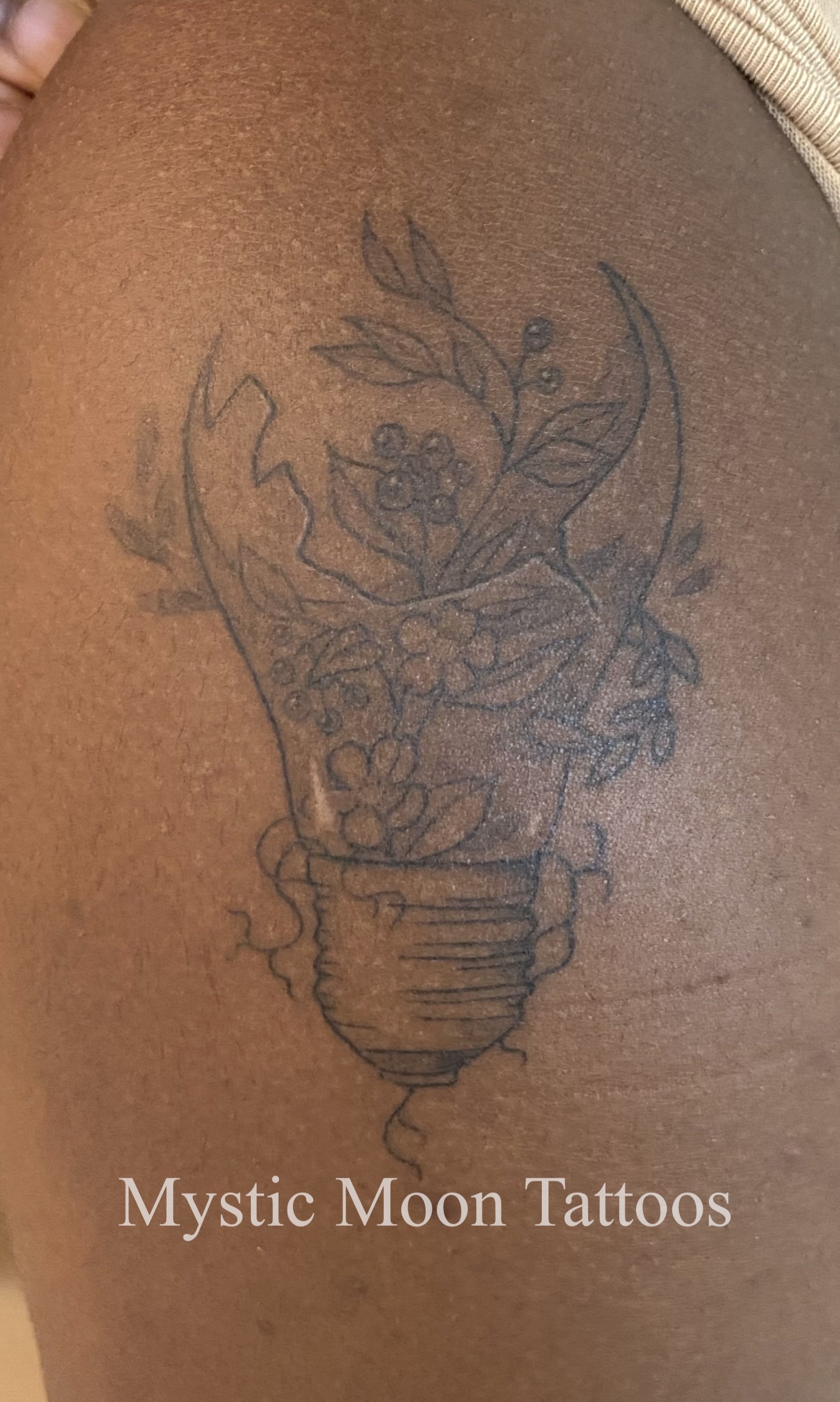 Delicate light bulb with white highlights.