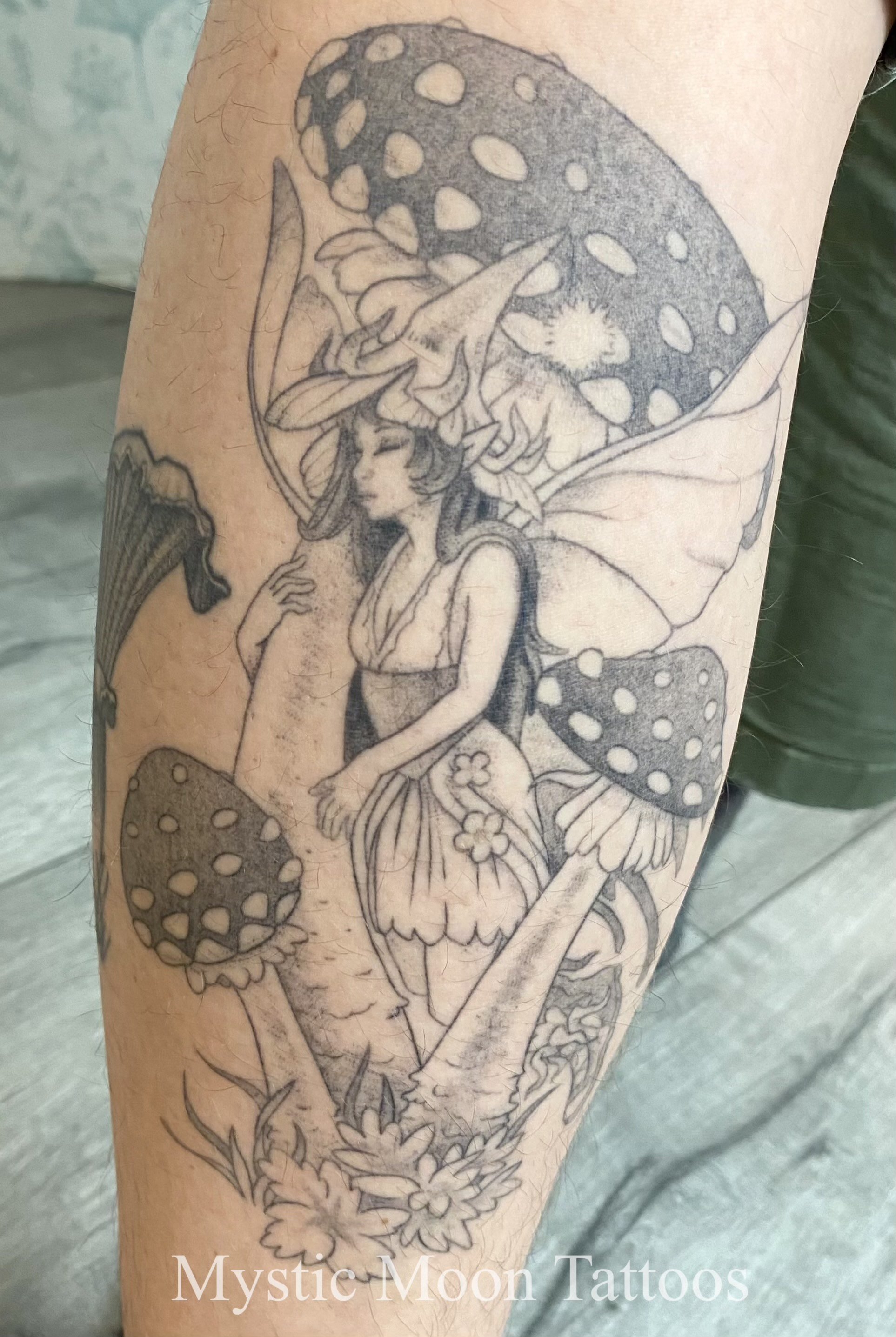 A fae gently gliding through some mushrooms, all healed.