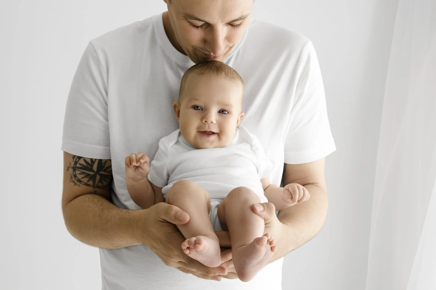 Parent with 3 month old baby at Mabel and Moose studio by Ally Stuart-Ross