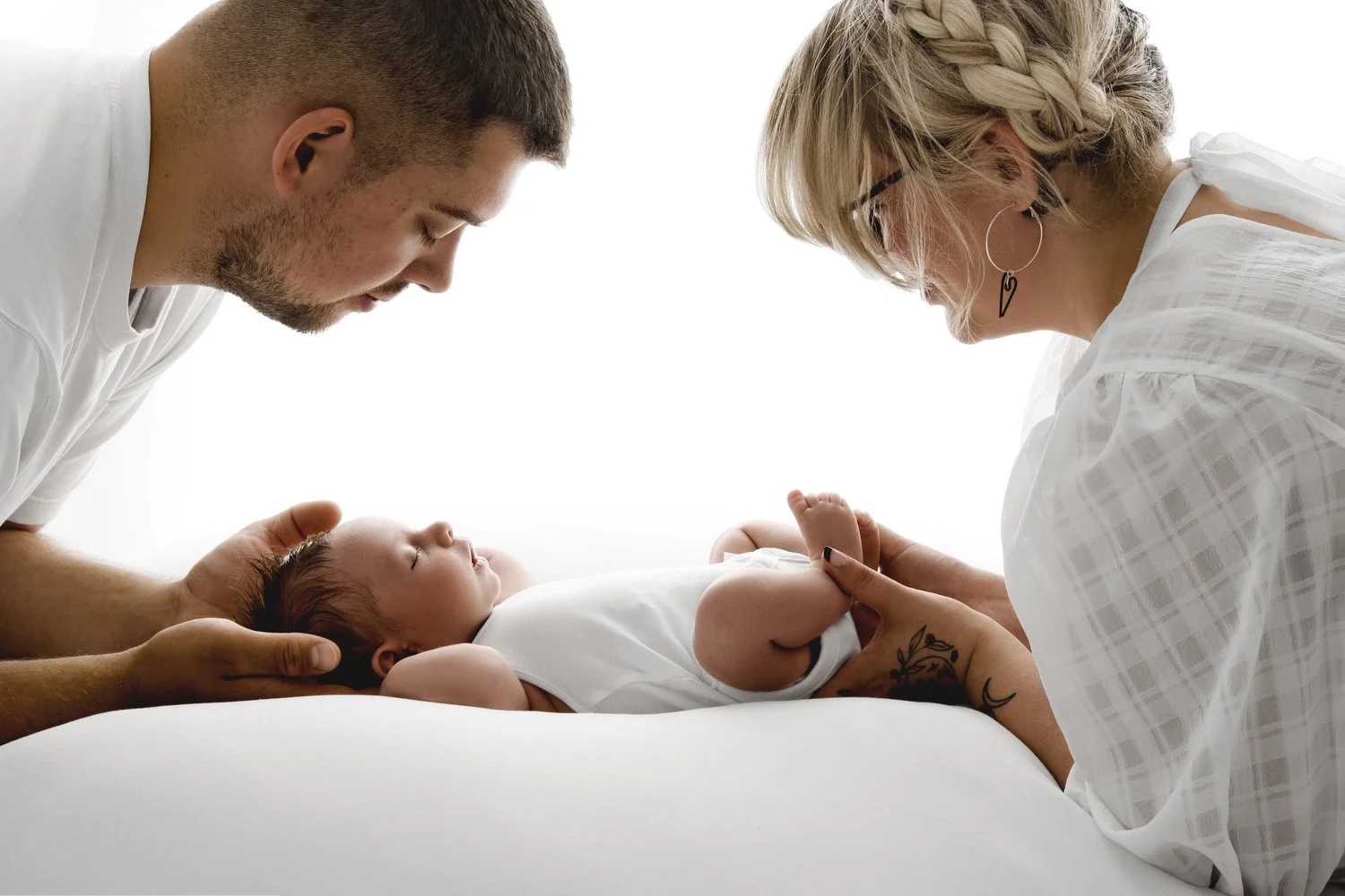 family with newborn baby at Mabel and Moose studio by Ally Stuart-Ross