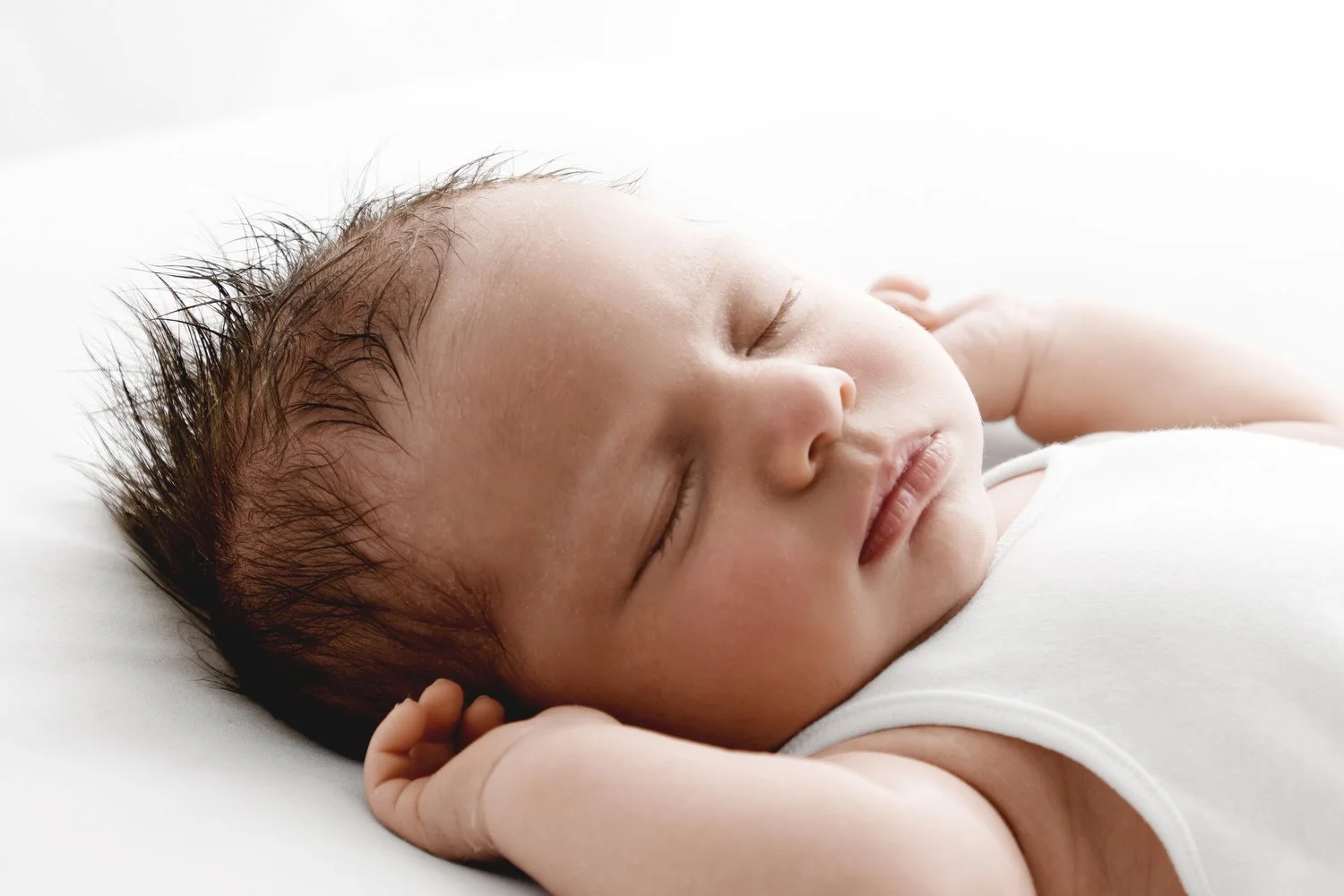 Sleeping newborn baby close up face at Mabel and Moose studio by Ally Stuart-Ross
