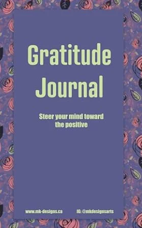 Cover of a Gratitude Journal with floral border and text: 'Gratitude Journal - Steer your mind toward the positive'. Website and Instagram handles provided at the bottom.