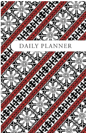 Daily planner cover with a black, white, and red geometric pattern.