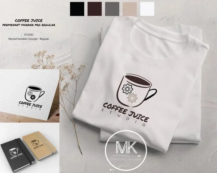 White T-shirt with a coffee mug logo and 'Coffee Juice Studio' text, placed on a flat surface alongside a small sign with the same logo, and color swatches at the top of the image.