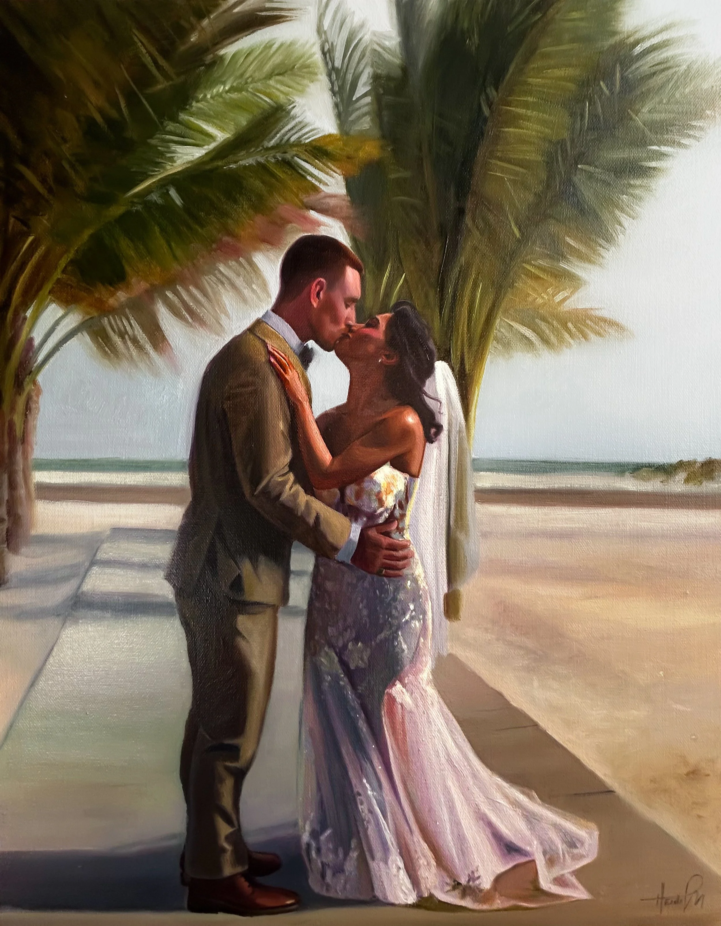 A romantic scene of a couple in wedding attire sharing a kiss on a beach under large palm trees, with the ocean in the background.
