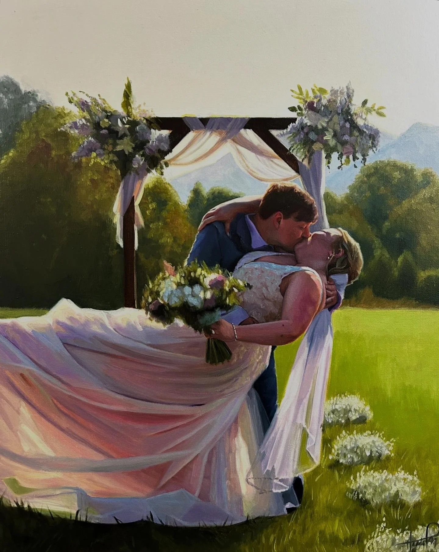 A romantic painting of a newlywed couple kissing outdoors under a decorated arbor, with a bouquet of flowers in the bride's hand, surrounded by lush greenery and mountains in the background.
