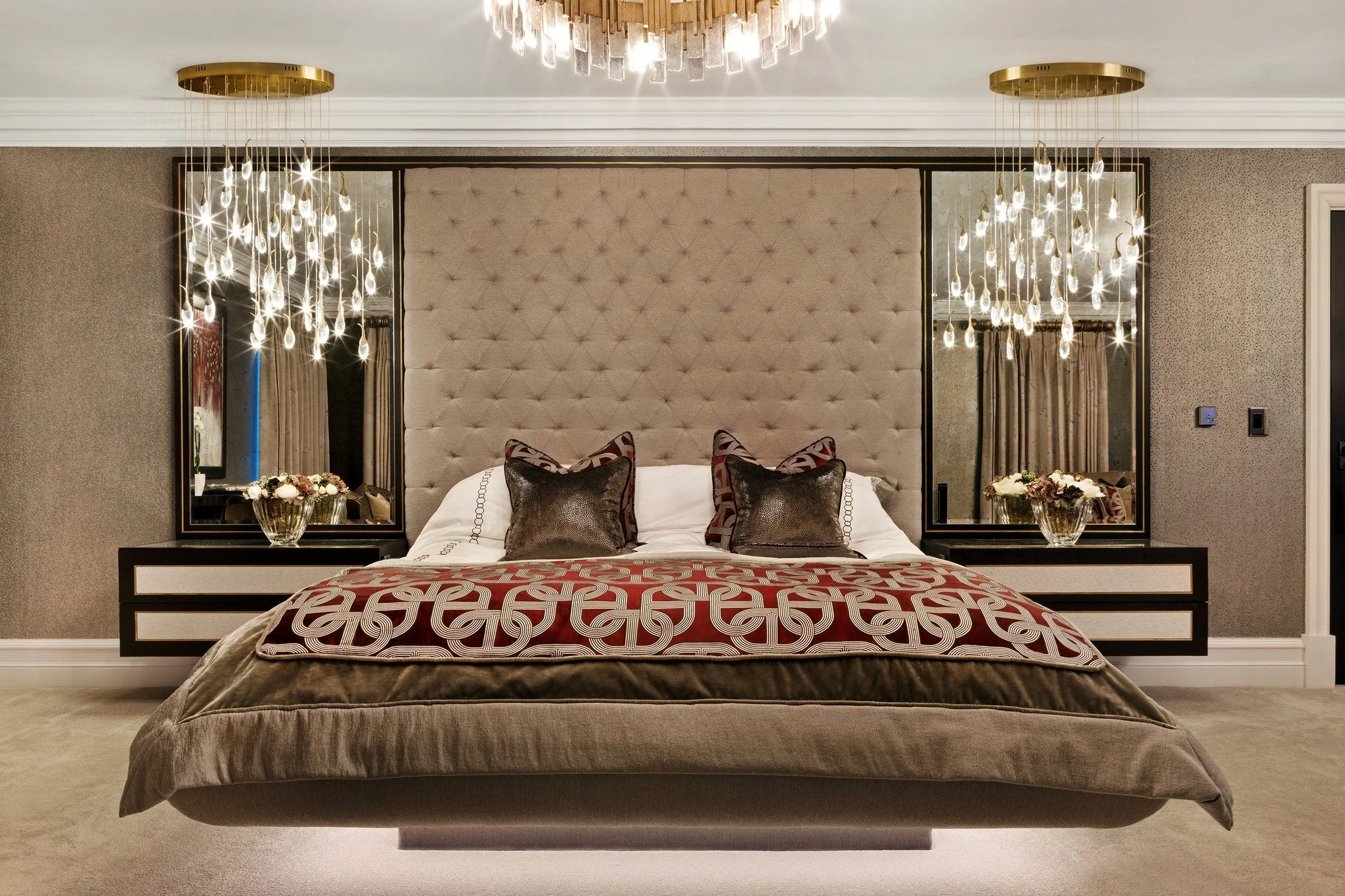 Take a look at this stunning master suite we have designed. It perfectly balances ultra-modern features with timeless, boutique-hotel comfort. Under-bed LED lighting creates an incredible, weightless illusion. Cascading crystal rain pendants paired w