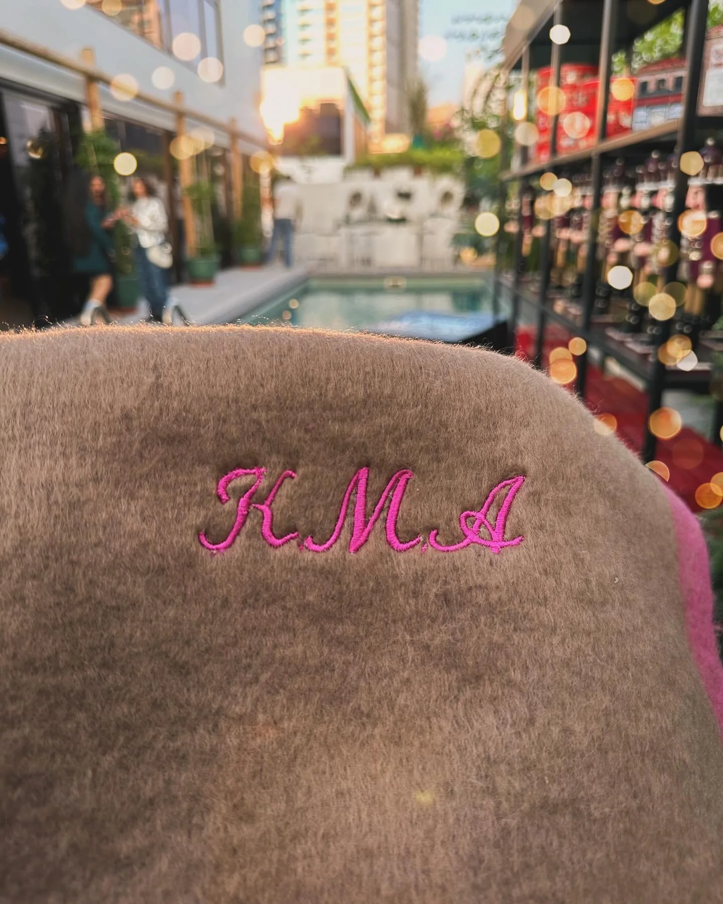 Camel scarf with fuchsia pink color embroidery 🪡 

.
.
.
.
.
#embroidery #machineembroidery #liveembroidery #personalization #embroiderycustomisation #livestation #storeactivation #events #eventprofsdubai #dubaievents #activation #embroider
