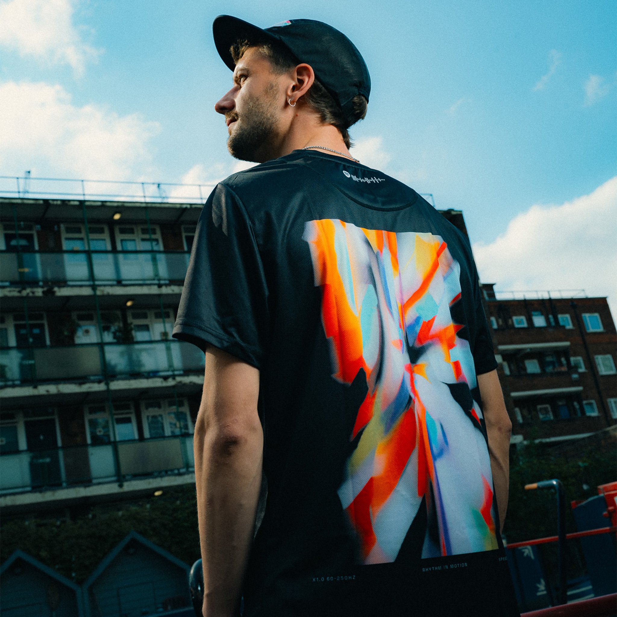 Product shot of UKF Rhythm in Motion t-shirt in black
