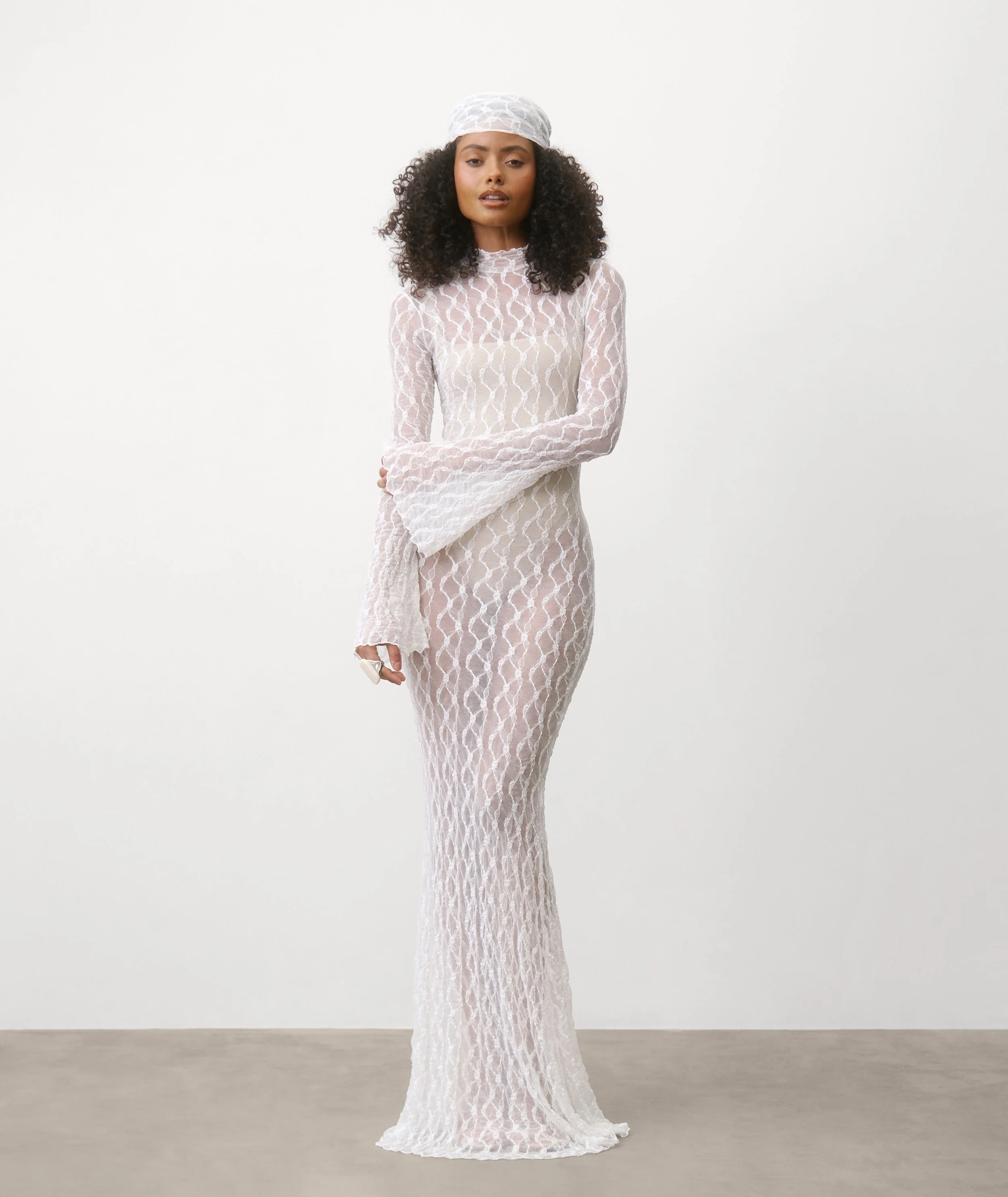 white-dress-catalina-lace-long-sleeved-maxi-resort-six-stories_1.jpg