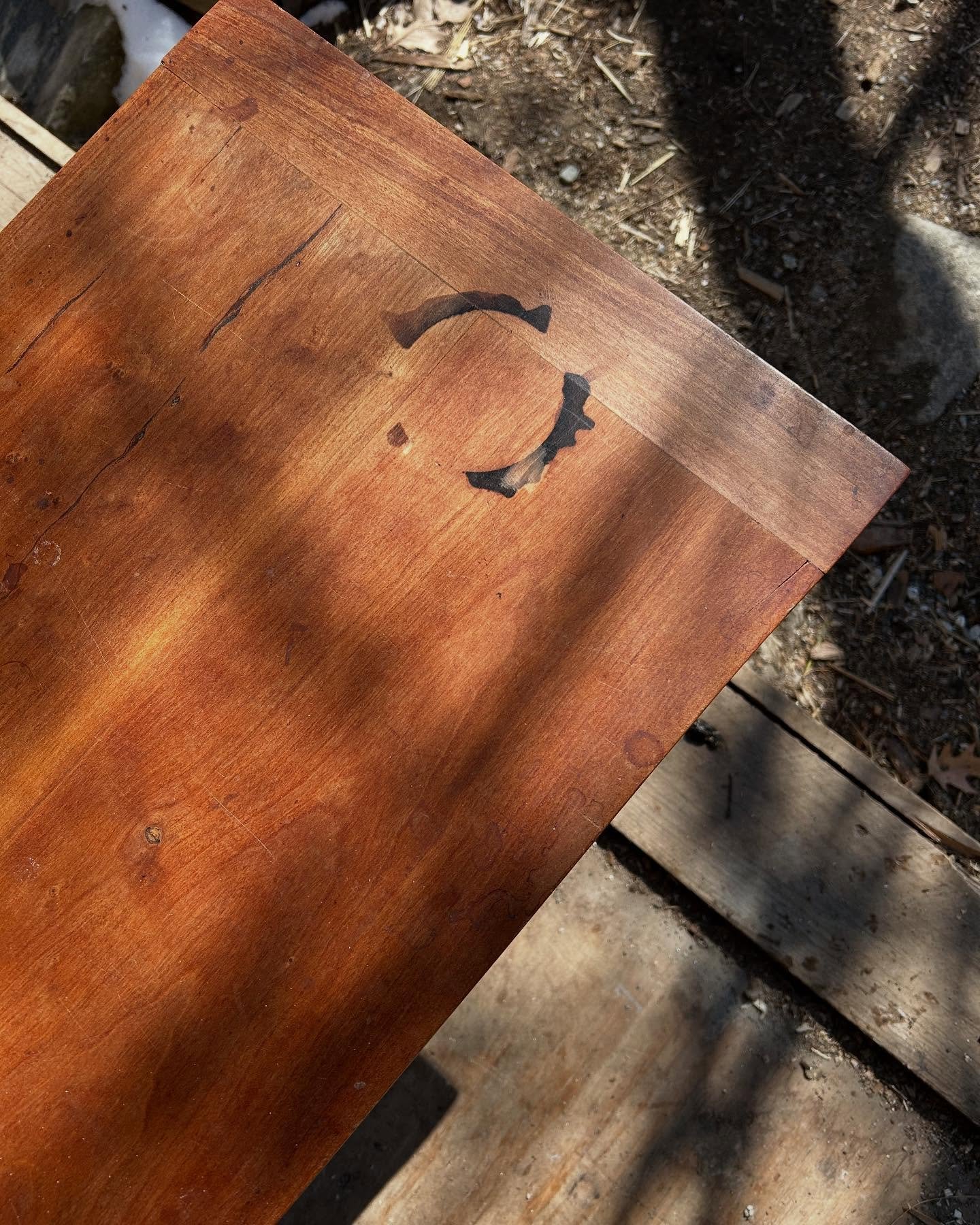 Mystery stain removed. Ended up using a card scraper on the entire top. Cherry finished with boiled linseed oil and wax.
