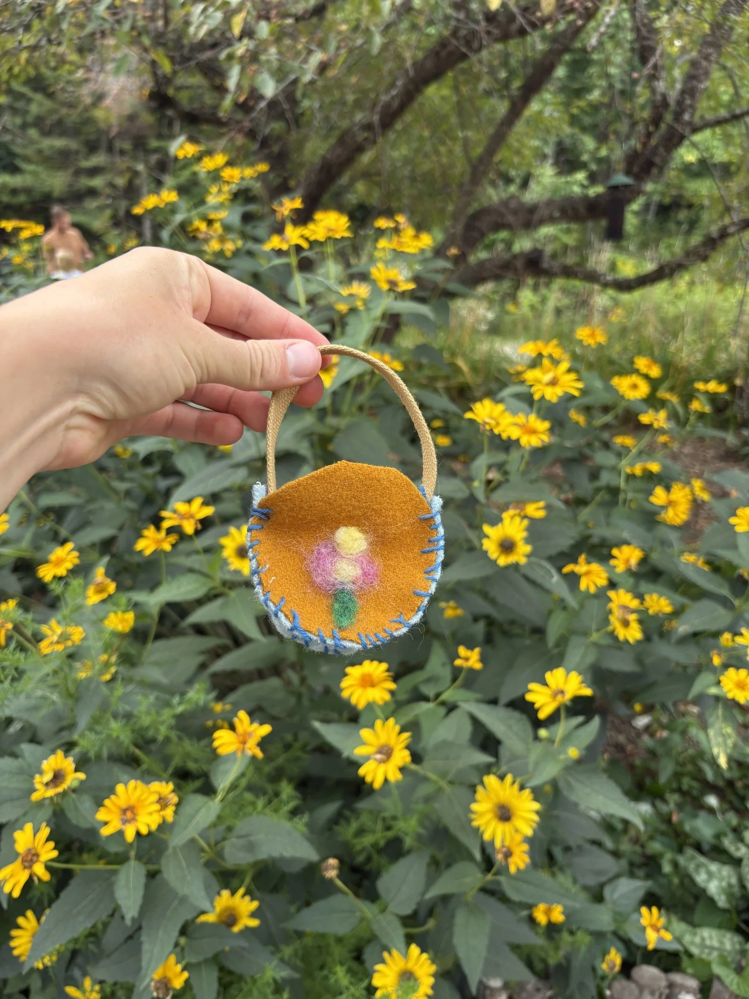 The cutest needle felted/hand stitched bags at the latest sewing class.