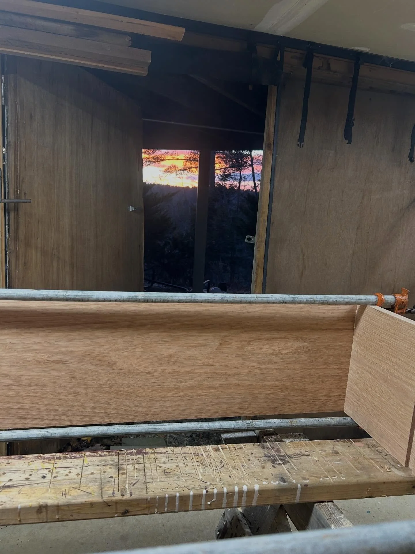 I get to enjoy a beautiful sun set during a full day glue up on this red oak book case install.