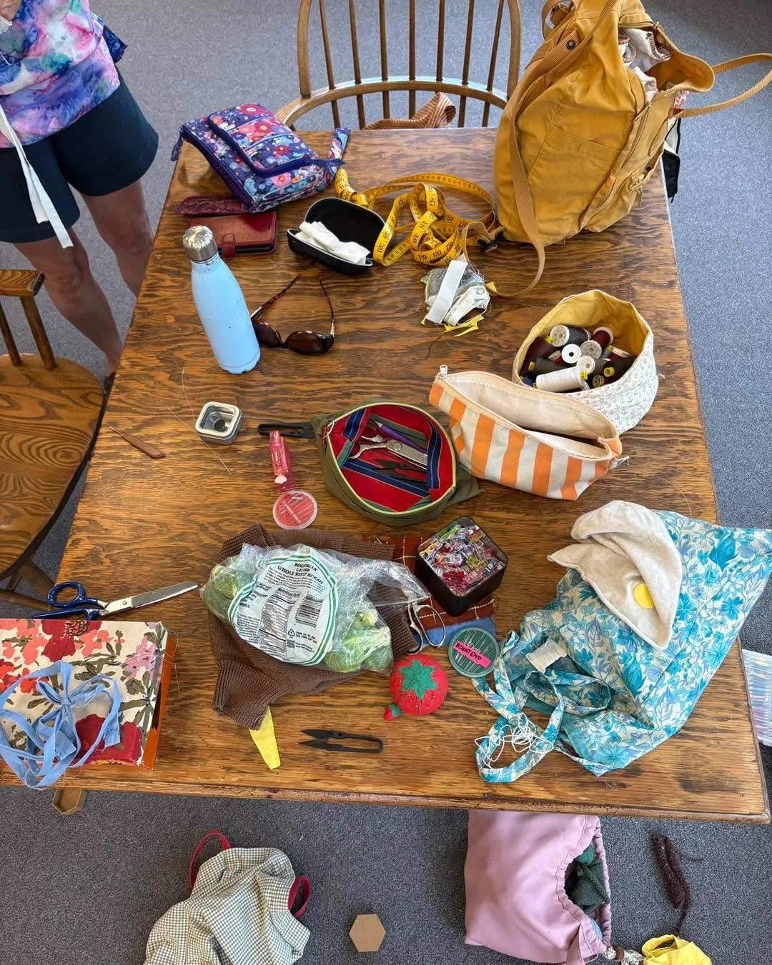 Yesterdays mending at the Searsmont Town Library. We replaced the elastic in silk pajama bottoms. Indigo played with a yarn ball until it wasn't a yarn ball anymore. Do you have a bag of clothes that need some TLC? We can help! See you next month!