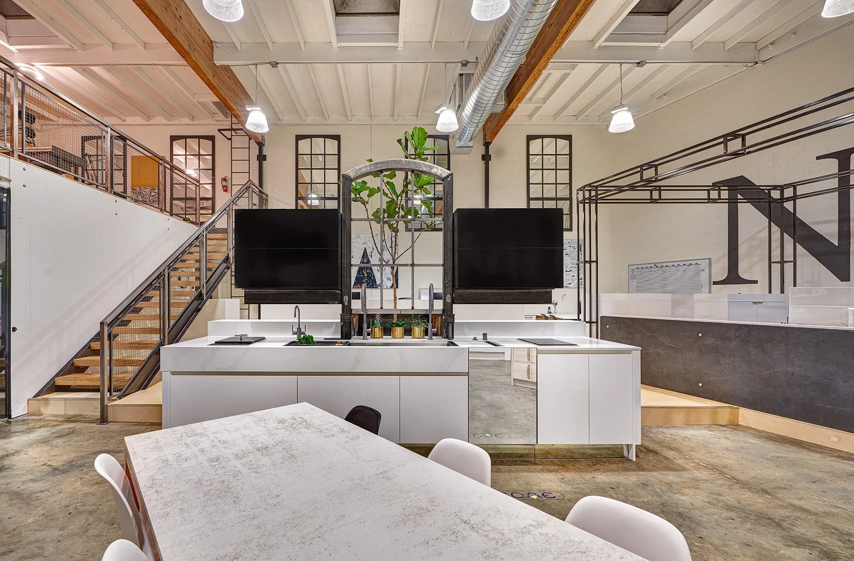 Interior design firm, showroom kitchen, European cabinetry, large beams, Sub-Zero, Wolf + appliances, The Galley workstation, appliance garage