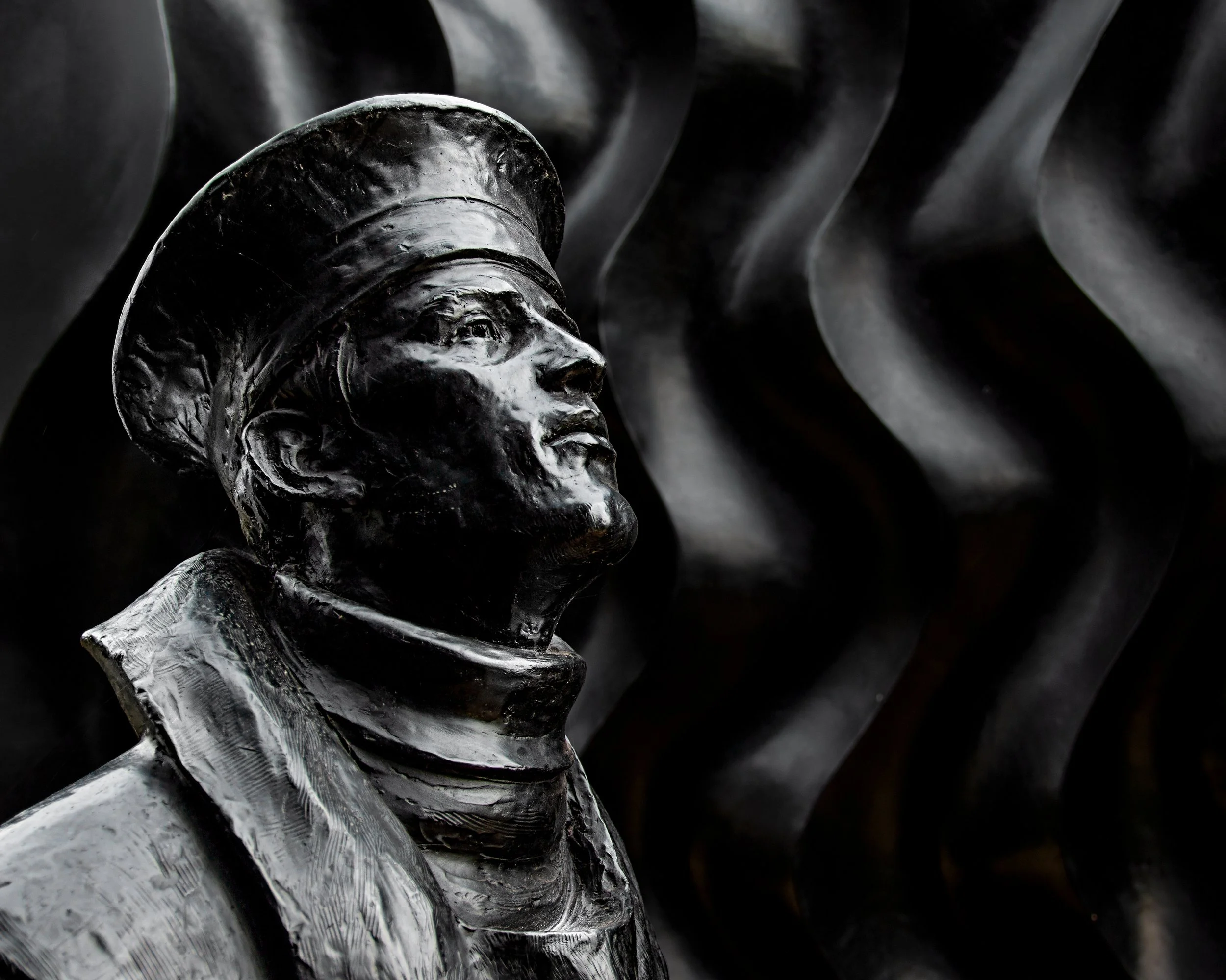 Portrait of WW2 memorial sculpture; a submariner in a conning tower