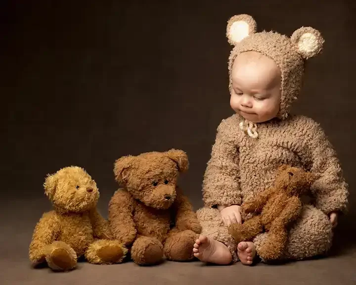 Portrait of baby dressed as a little bear