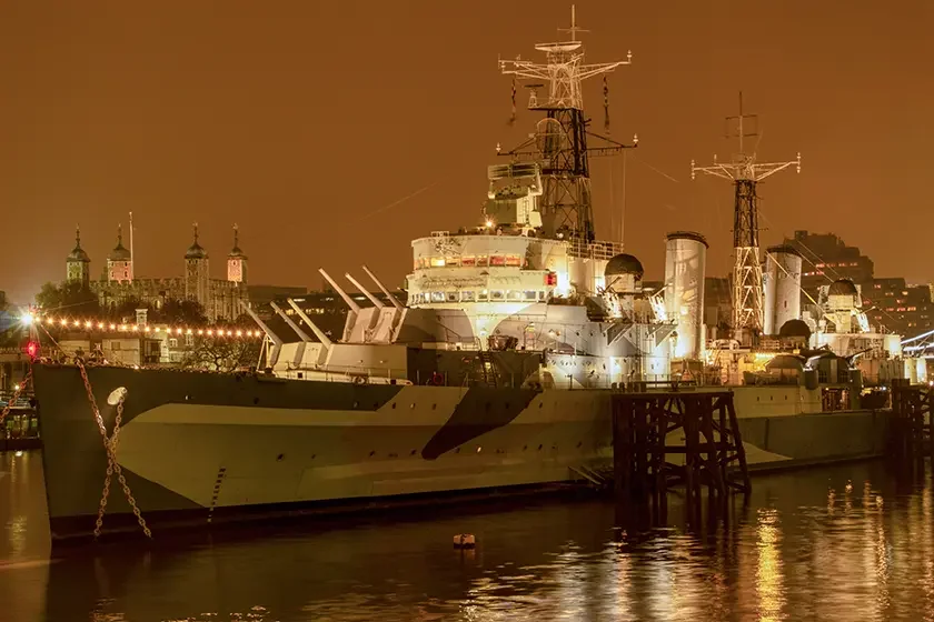 Landscape image of HMS Belfast at night