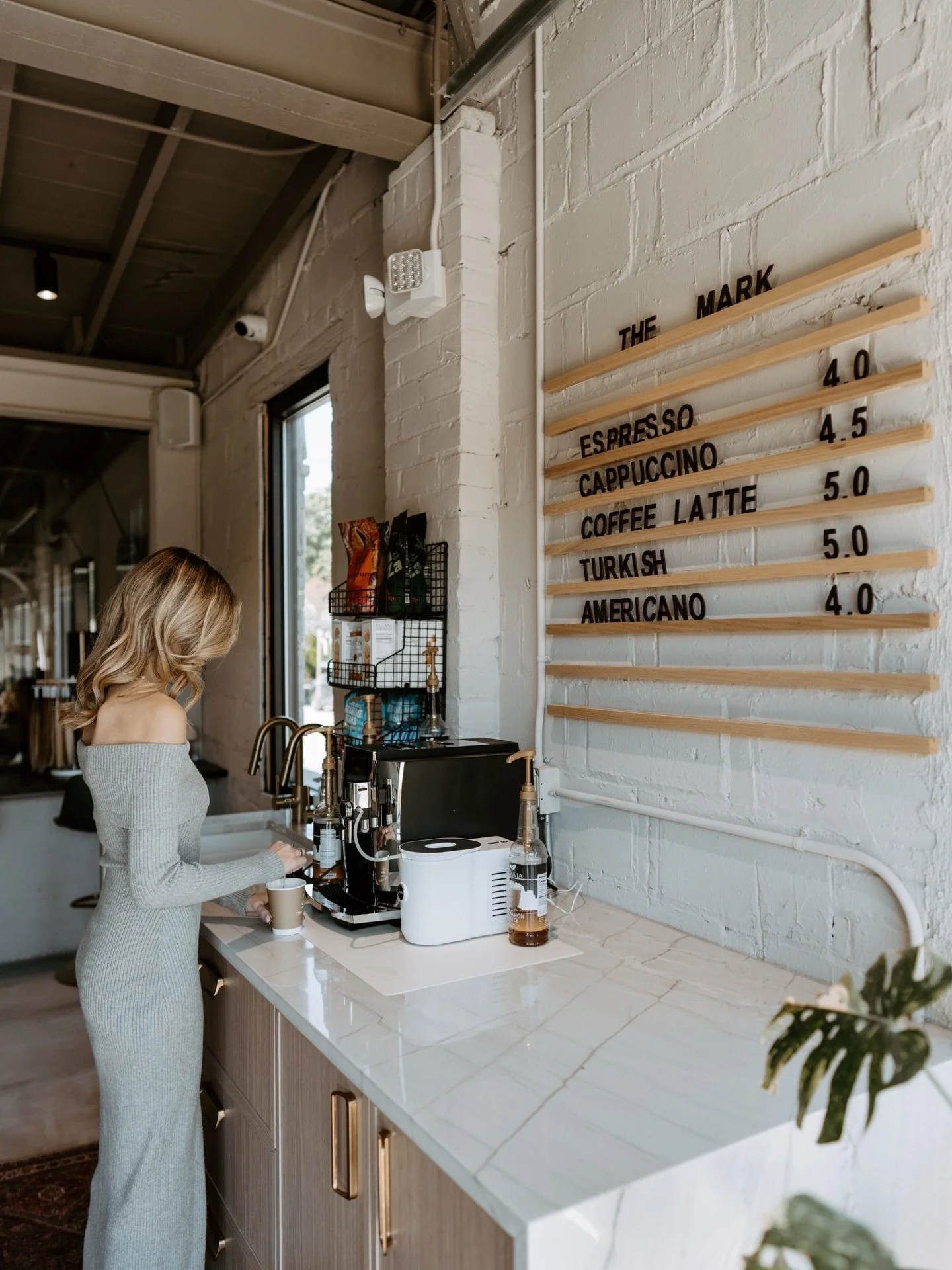 The Mark caf&egrave; &mdash; come for the latte, stay for vibes.