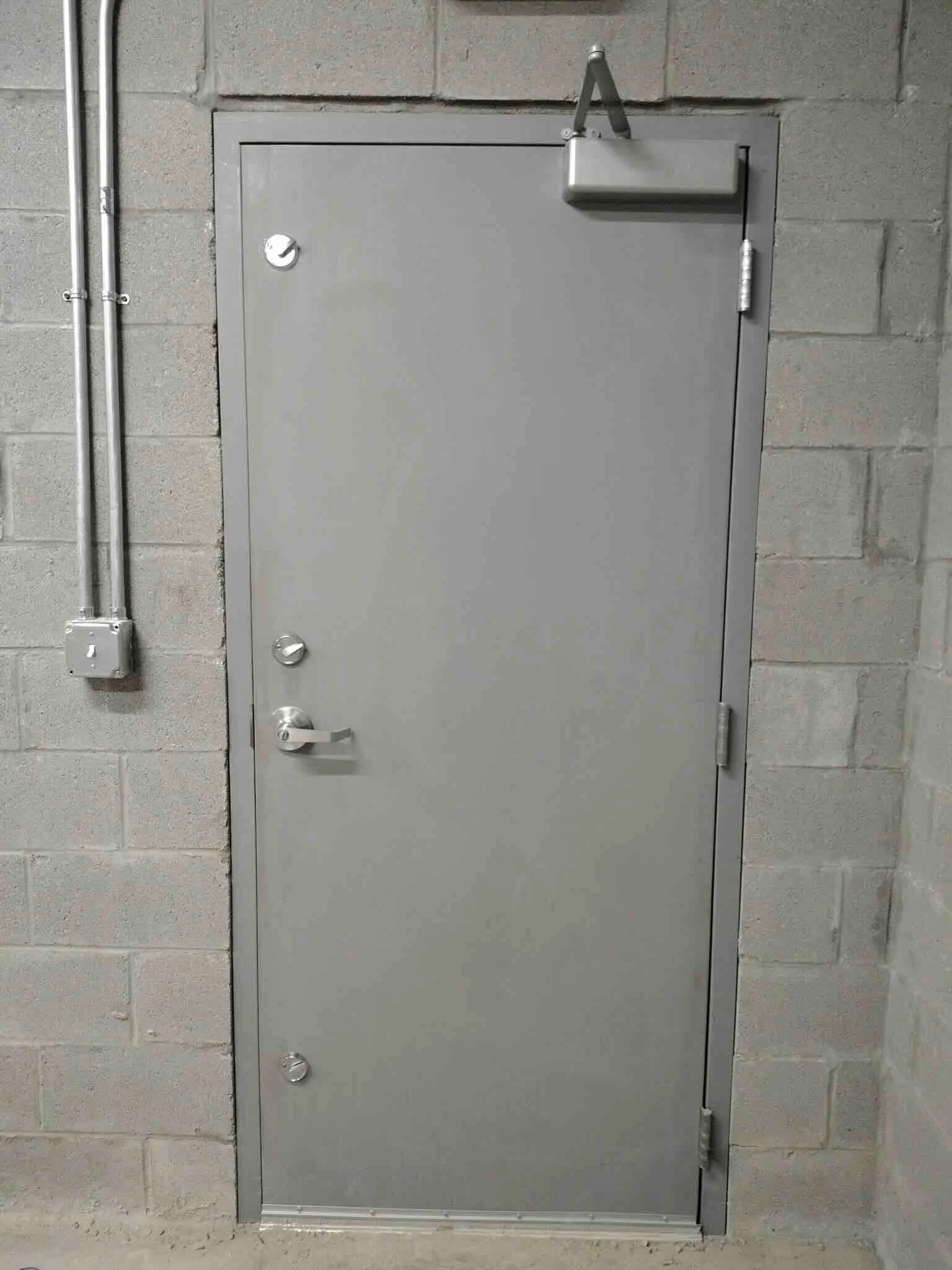 Commercial safe room and tornado storm shelter door installation in Tulsa, Oklahoma.