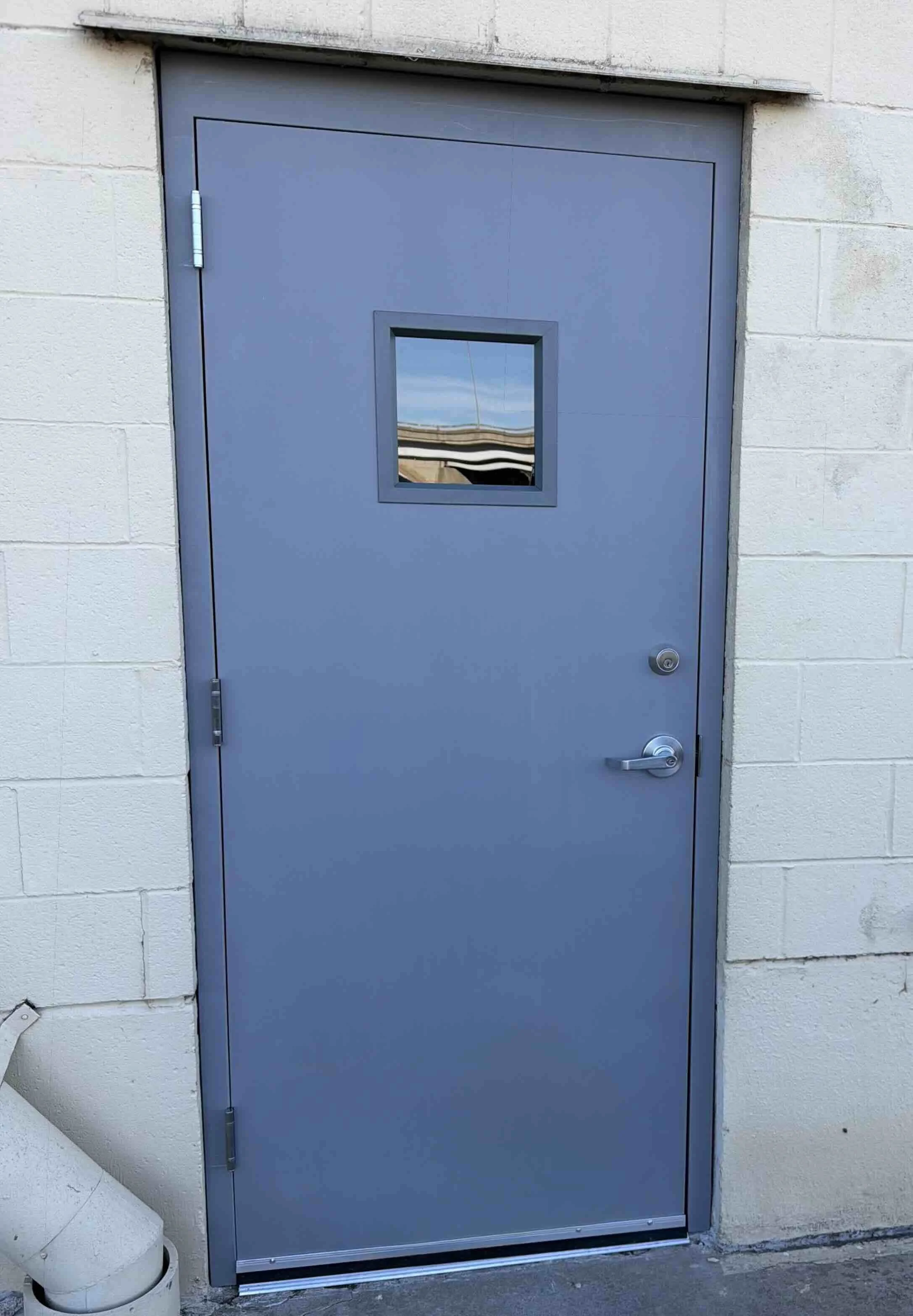Hollow metal door installation. Commercial door installation in Broken Arrow Oklahoma. Commercial Door Repair in Broken Arrow Oklahoma.