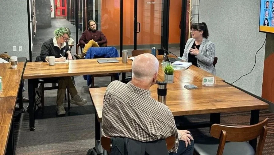 Facilitator leads a group discussion to identify challenges in the workplace