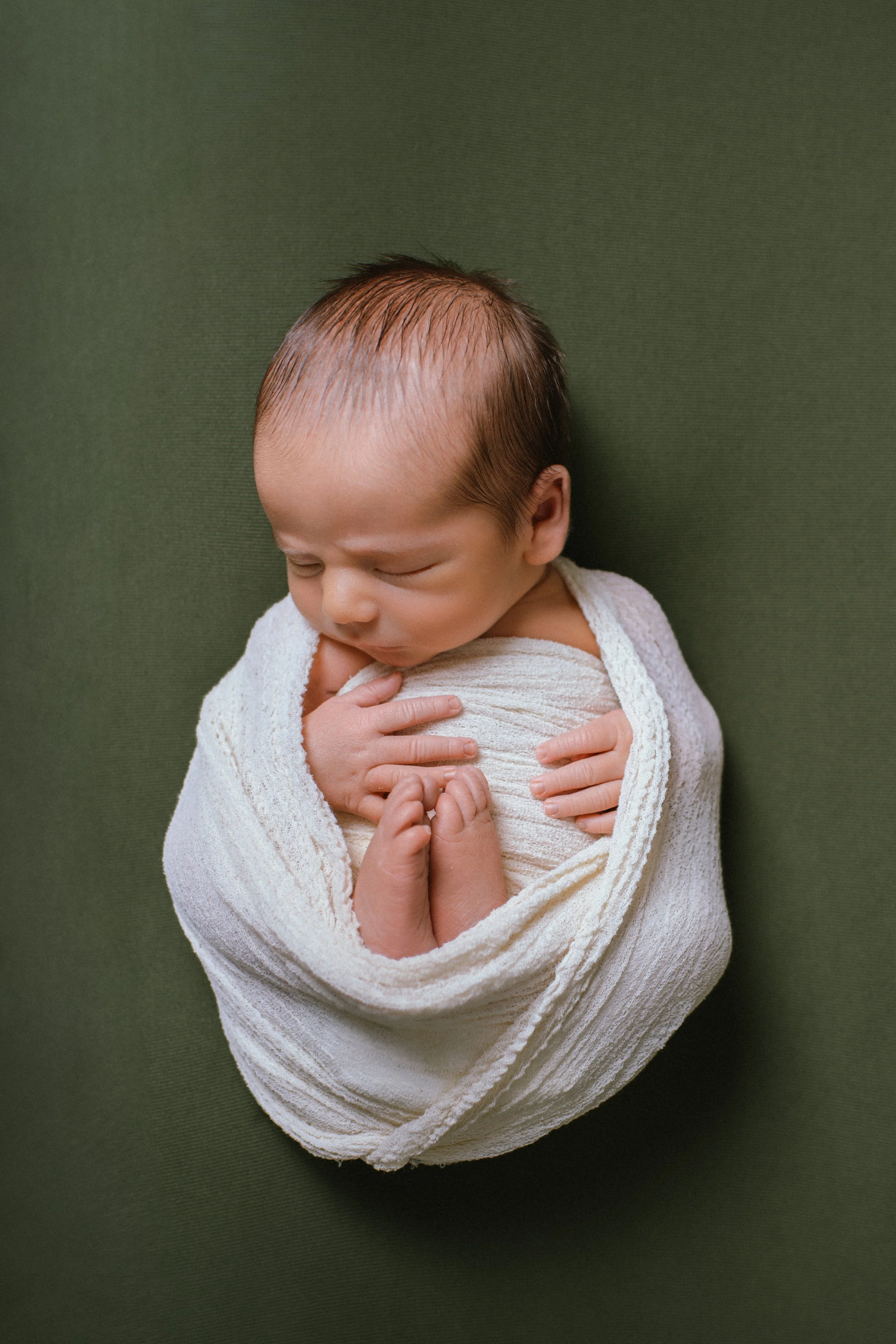 newborn baby wrapped