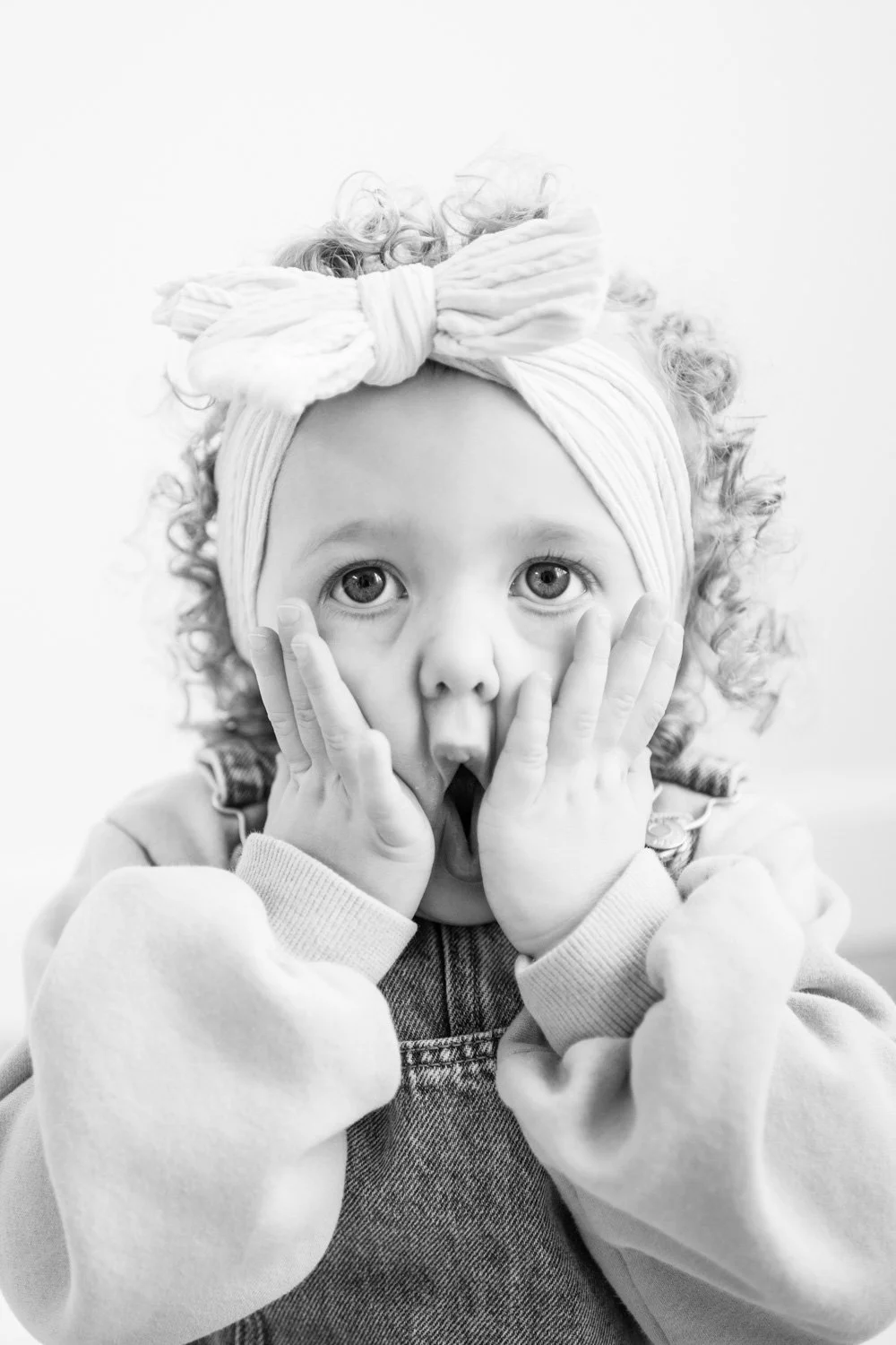 studio girl shocked face black and white