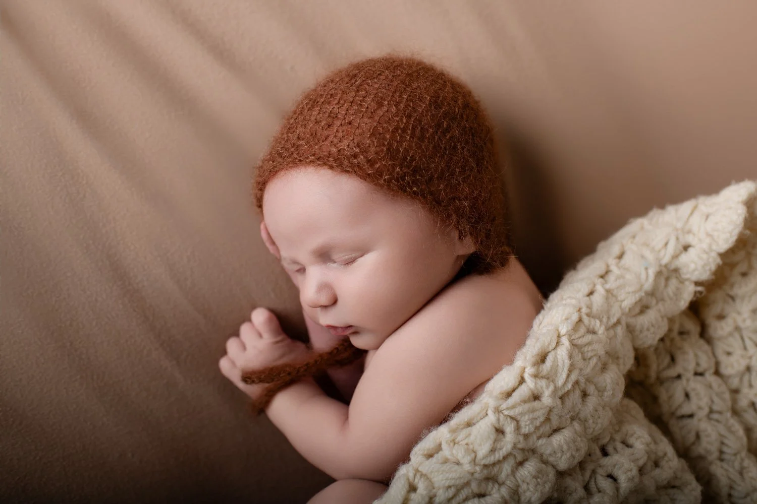 newborn baby boy studio photography, creams and tans