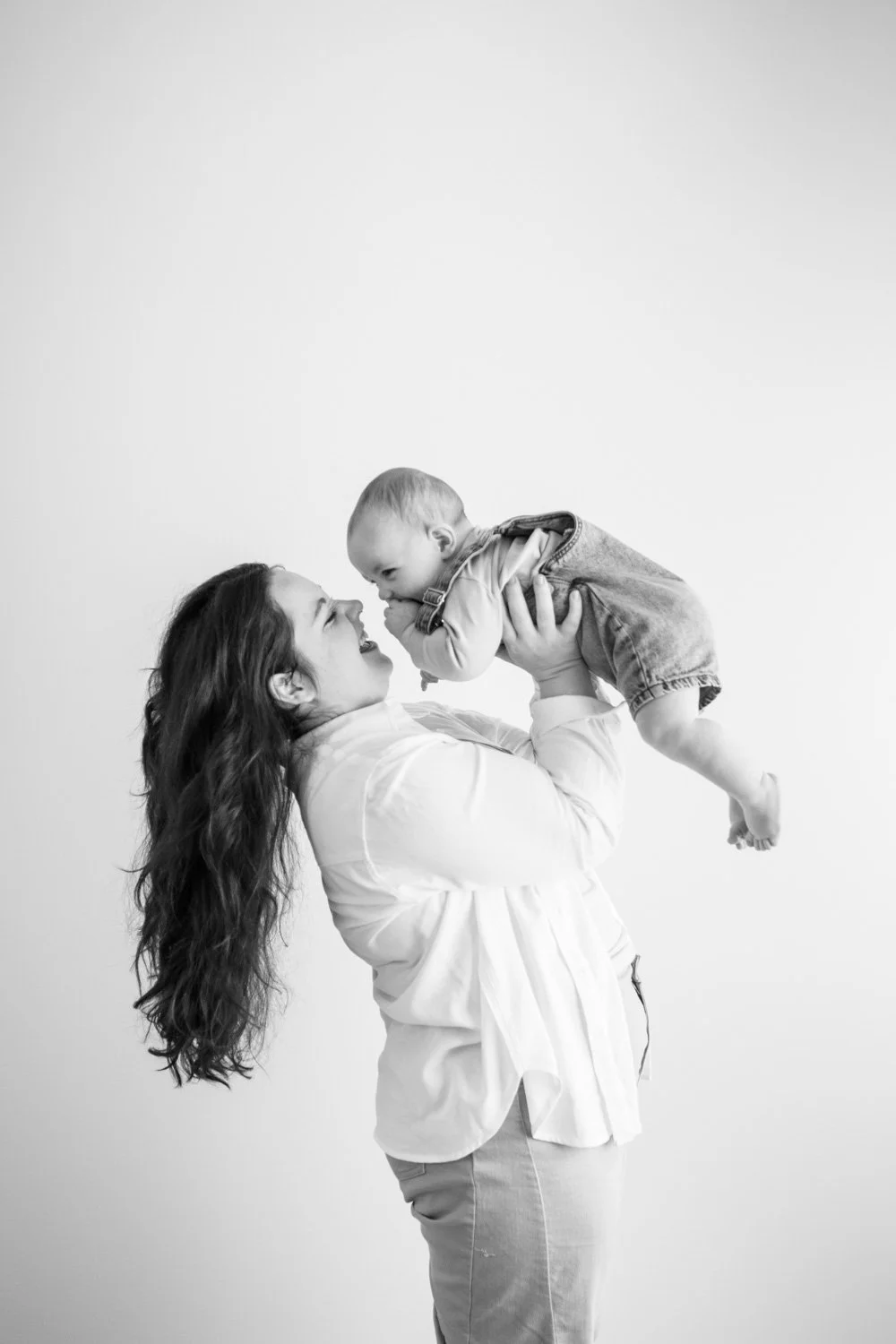 studio black and white mom and son