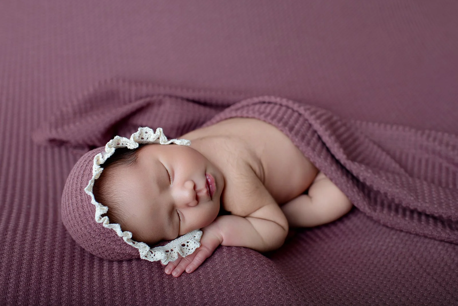 newborn baby studio wrapped