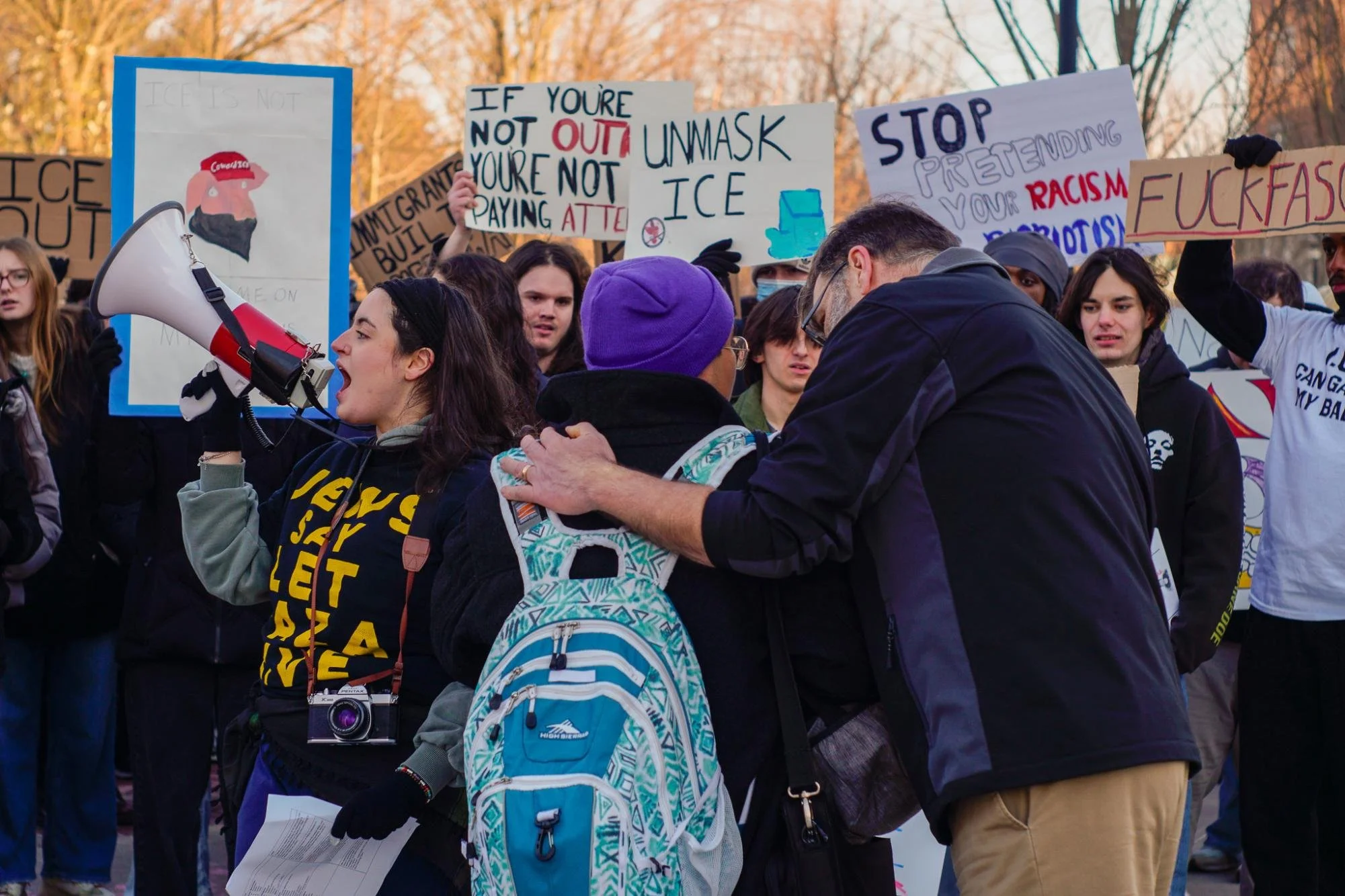  Dean of Students Kevin Koett speaks with a student amongst the protest. Thurs. Feb 5, 2026. (Photographer: Nick DiCicco) 