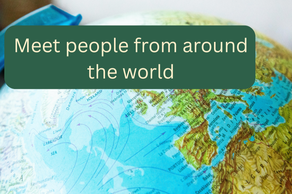 Close-up of a world globe with a green text overlay that says 'Meet people from around the world'.