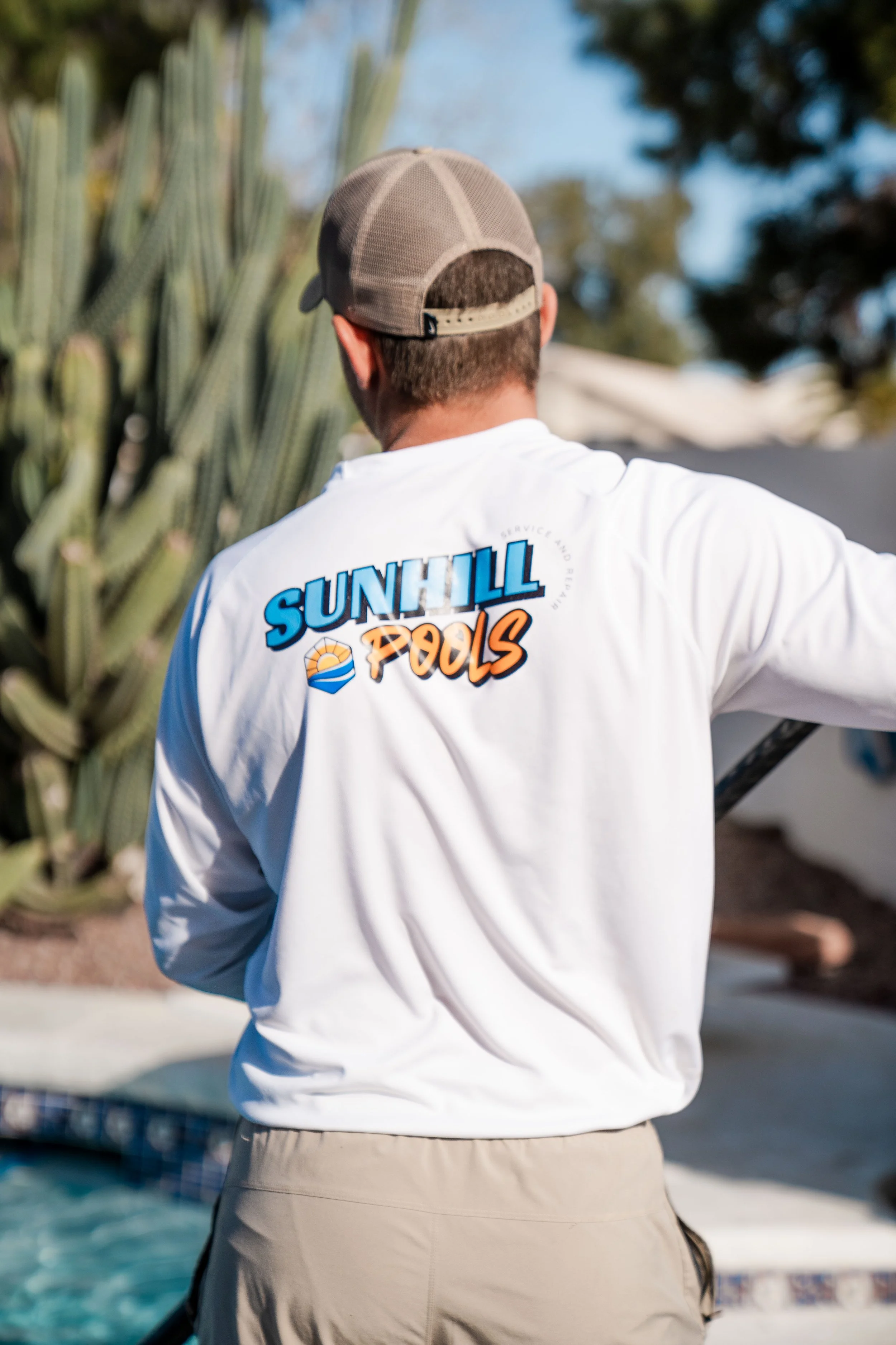 pool tech repairing a pool